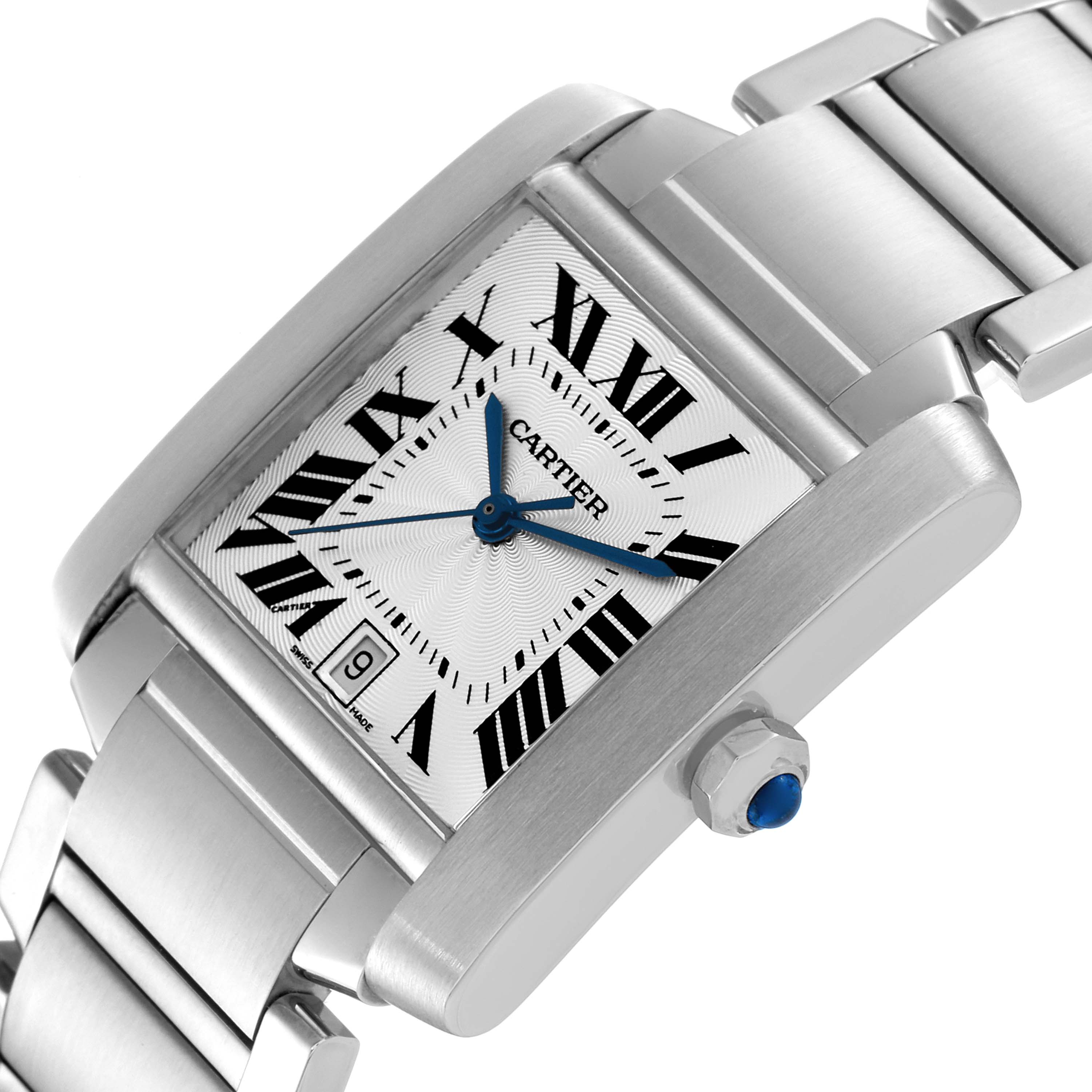 The image displays a close-up of a Cartier Tank Francaise W51002Q3 Men's Stainless Steel Silver Dial W51002Q3 Men's Stainless Steel Silver Dial watch, featuring its dial, crown, and part of the bracelet.