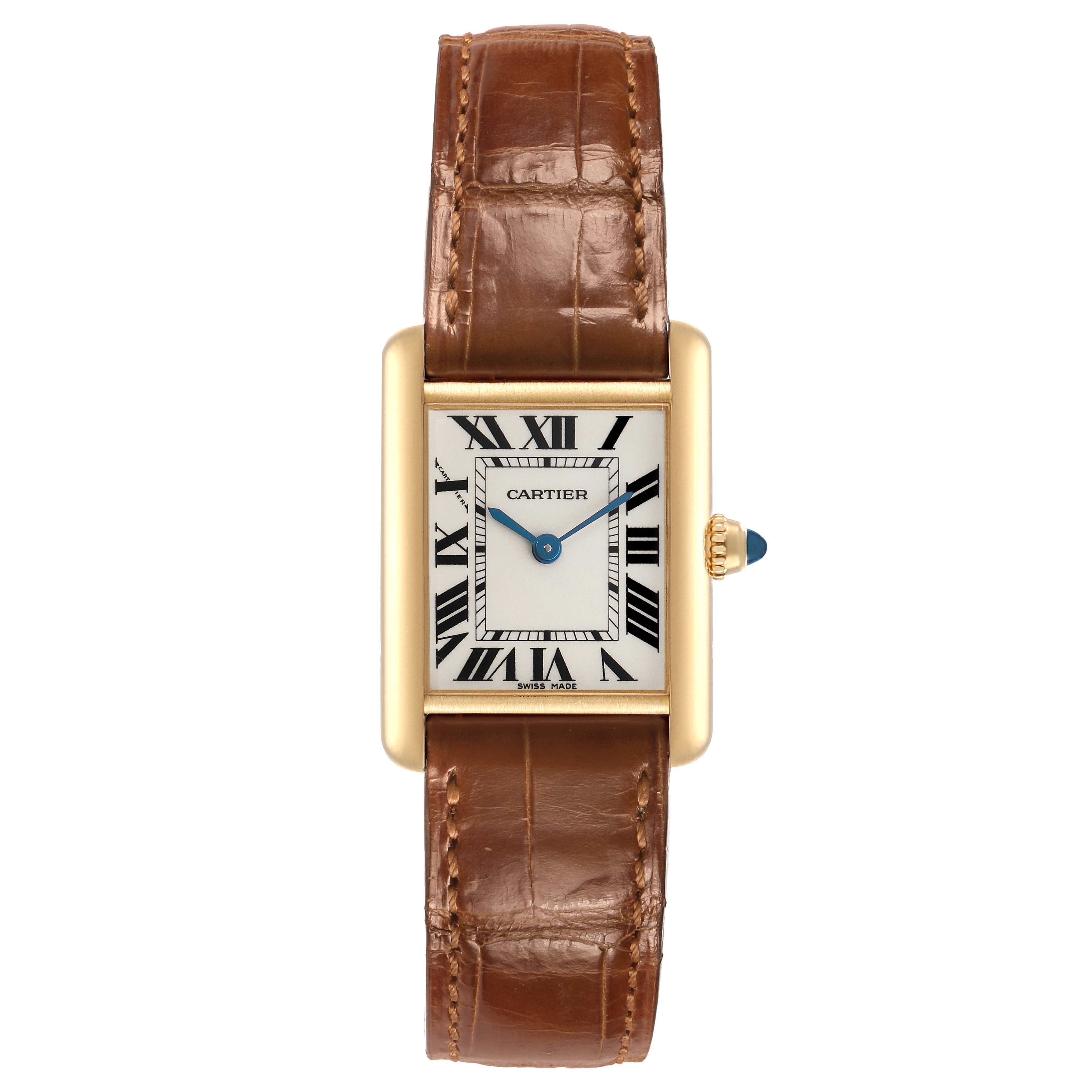 The Cartier Tank Louis W1529856 Women's Yellow Gold Silver Dial watch is shown from a top view, displaying its rectangular face, leather strap, and gold casing with a blue sapphire crown.