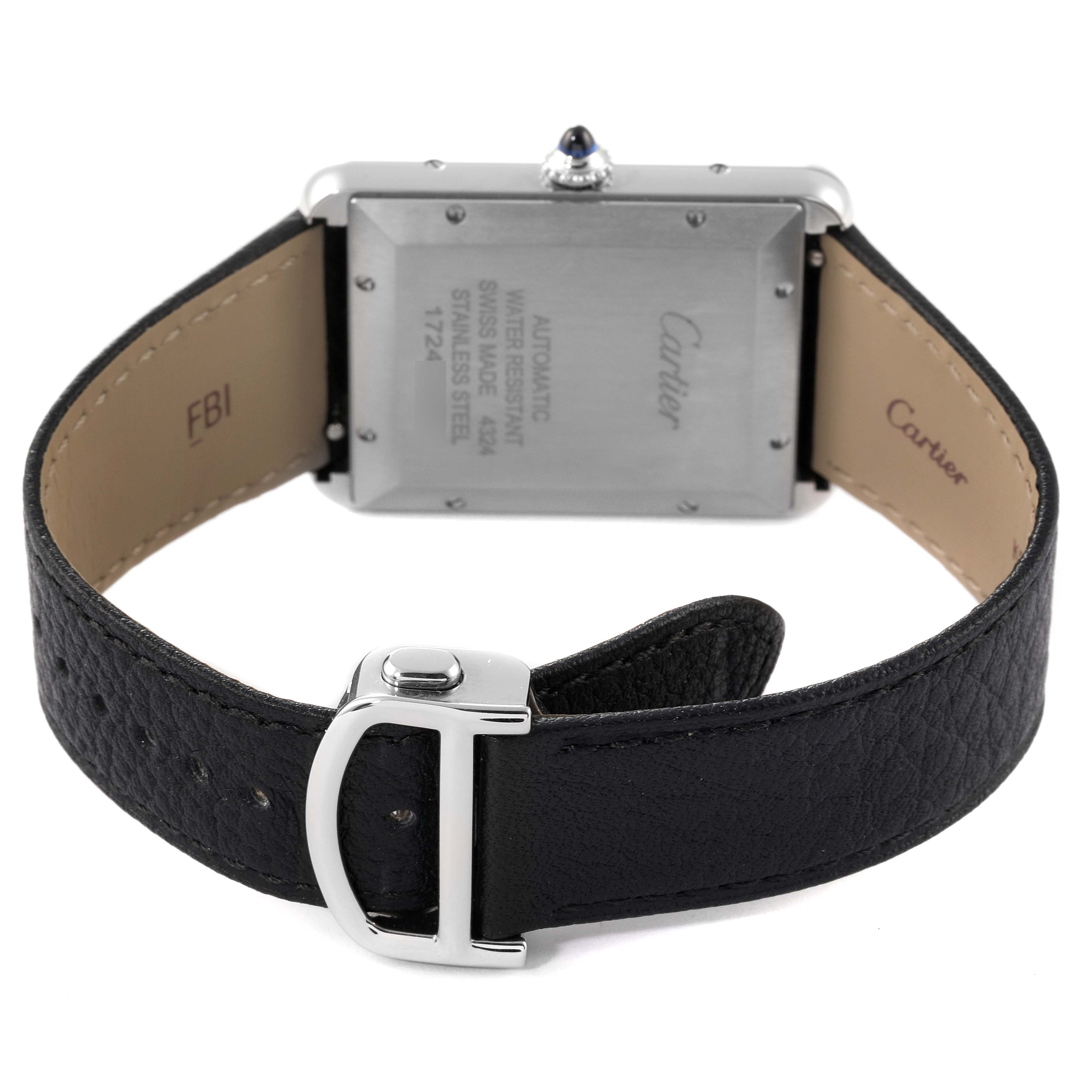 This image shows the back view of a Cartier Tank Classic model, highlighting its case back, crown, and leather strap with a buckle.