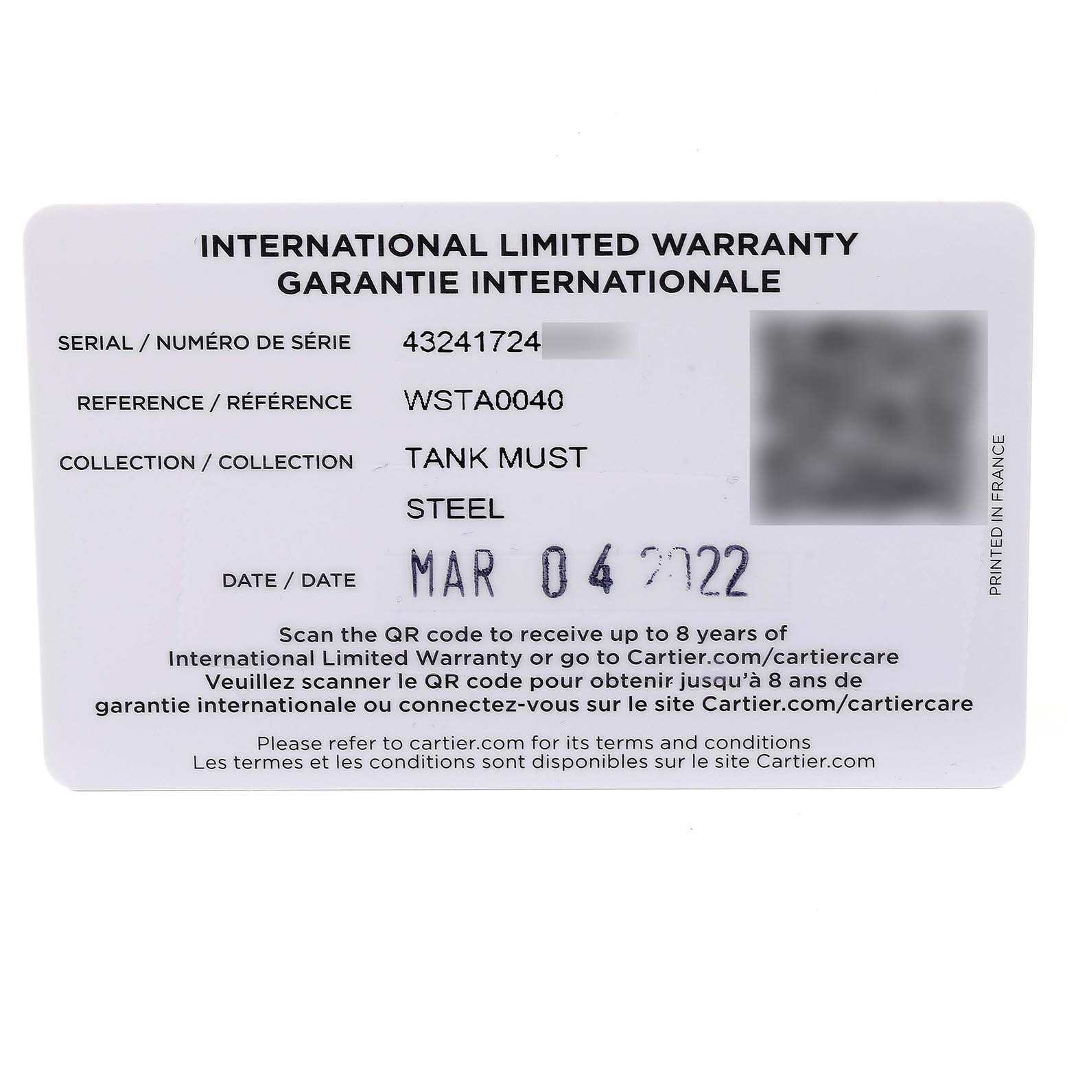 The image shows an International Limited Warranty card for the Cartier Tank Must WSTA0040 Men's Stainless Steel Silver Dial WSTA0040 Men's Stainless Steel Silver Dial watch.