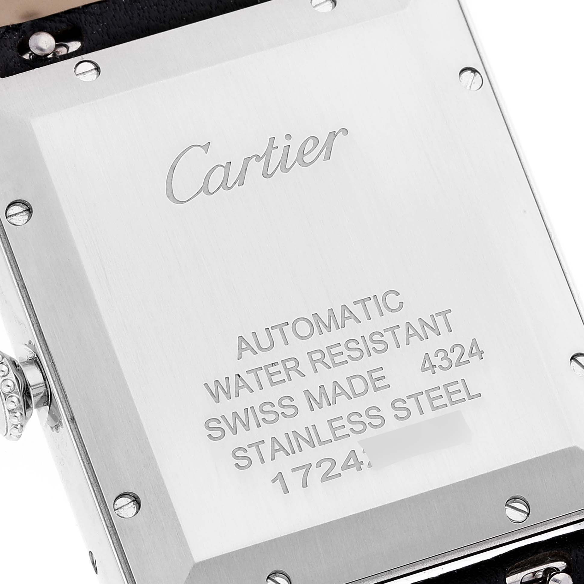 The image shows the back case of a Cartier Tank Classic watch, including its inscriptions and a portion of its strap.