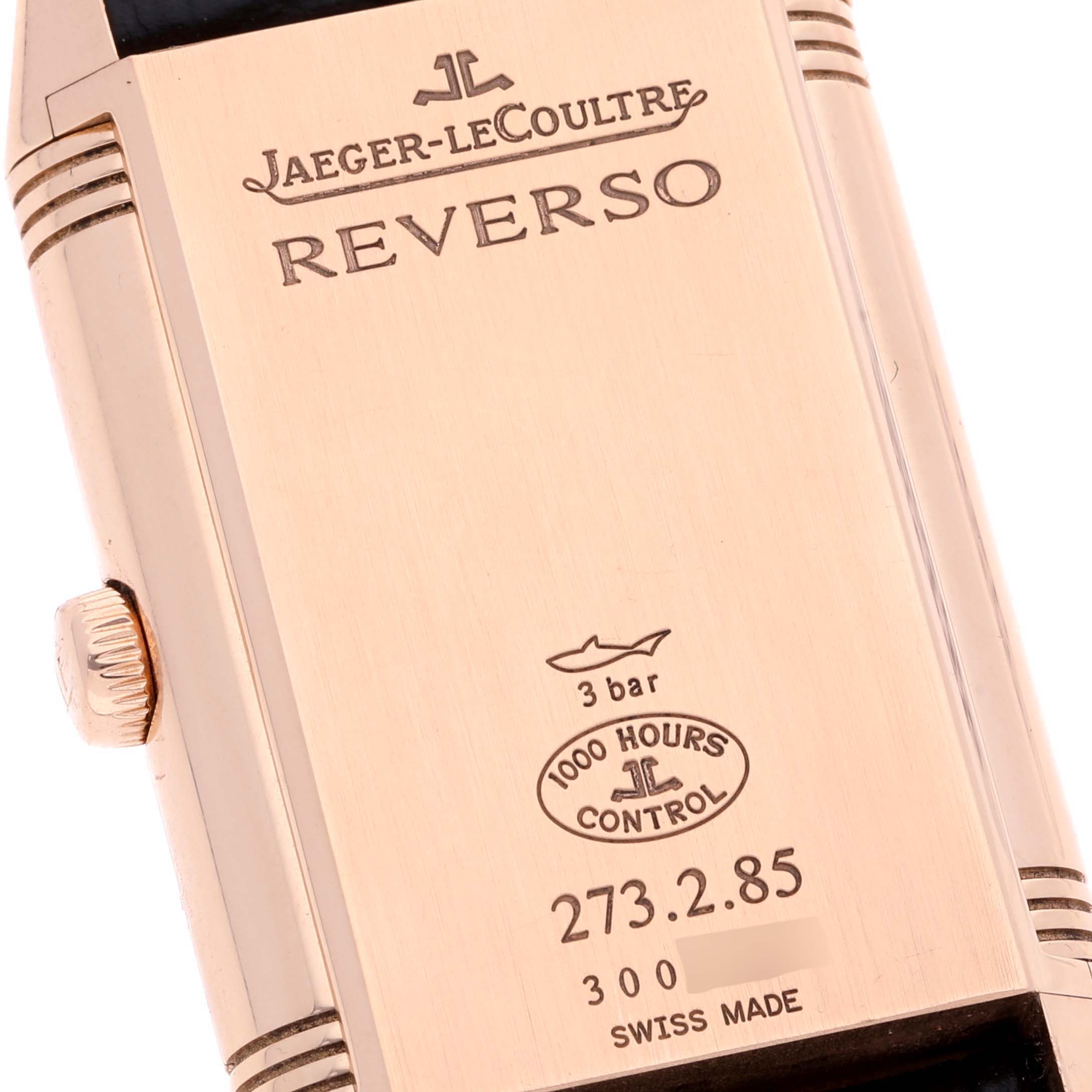 This image shows the back casing of a Jaeger-LeCoultre Reverso watch at a slight angle.