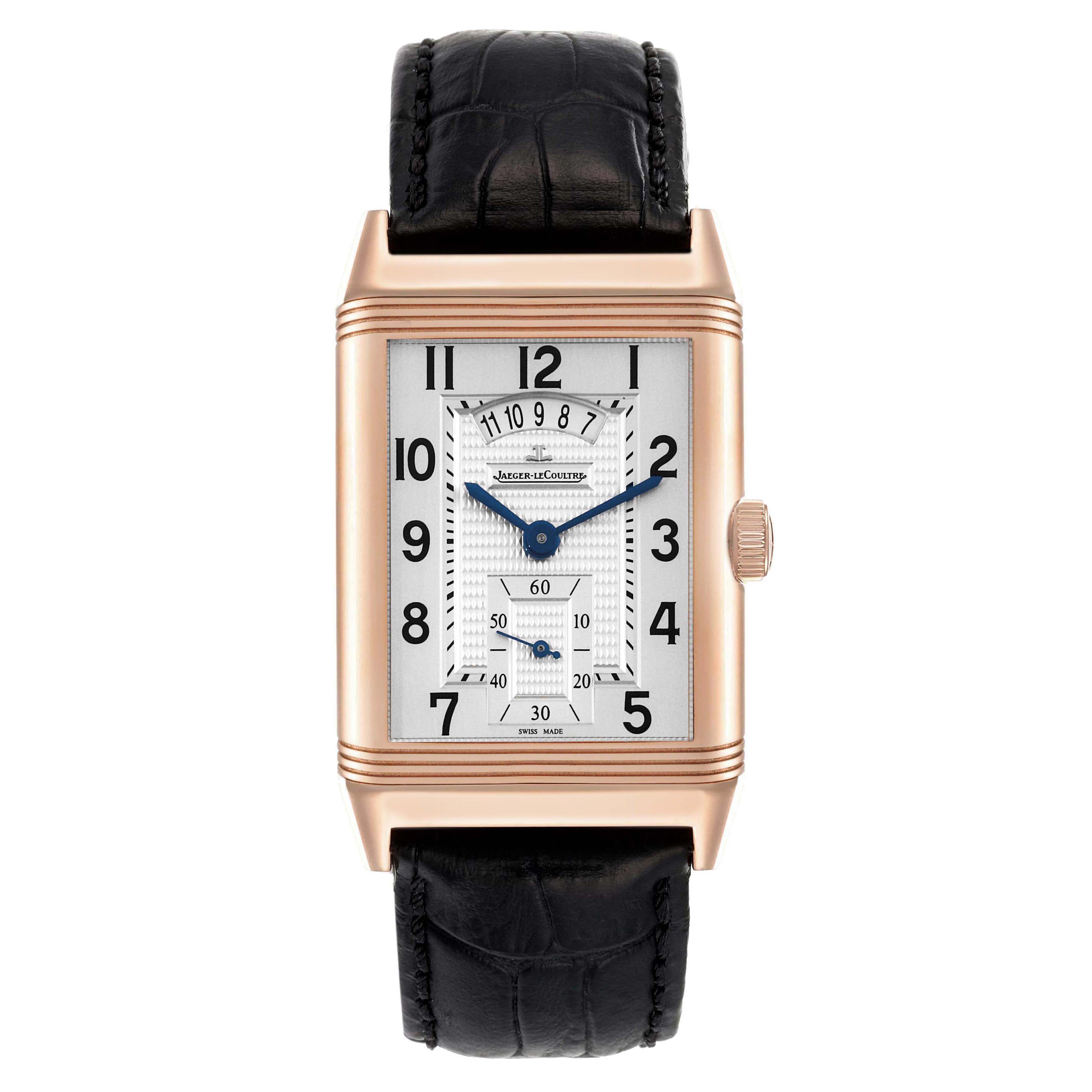 The image shows a frontal view of a Jaeger-LeCoultre Reverso watch with a rectangular dial and black leather strap.