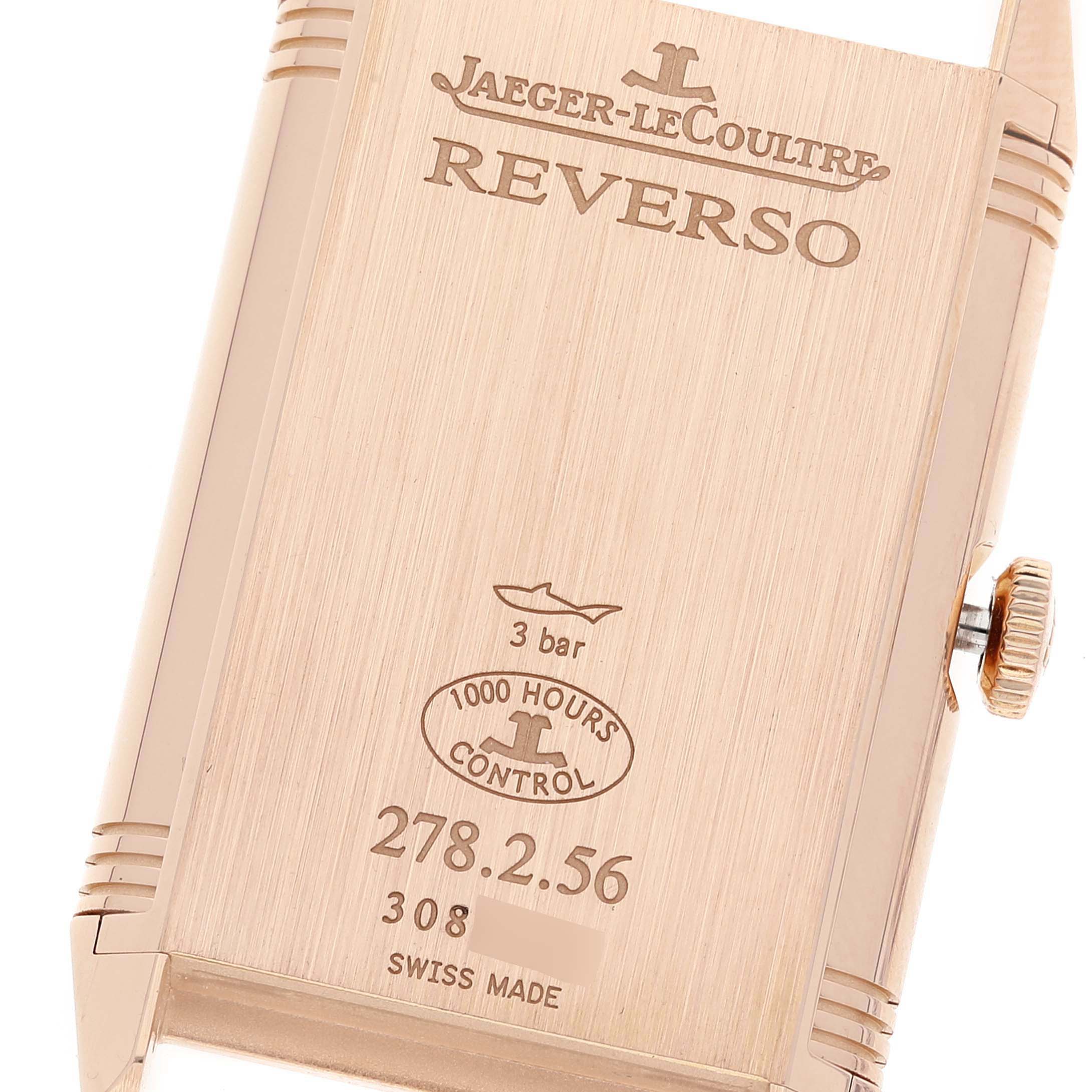 The image shows the back case and crown of a Jaeger LeCoultre Reverso Q3802520 Men
s Rose Gold Silver Dial Q3802520 Men
s Rose Gold Silver Dial watch, highlighting the "3 bar" and "1000 Hours Control" embossments.