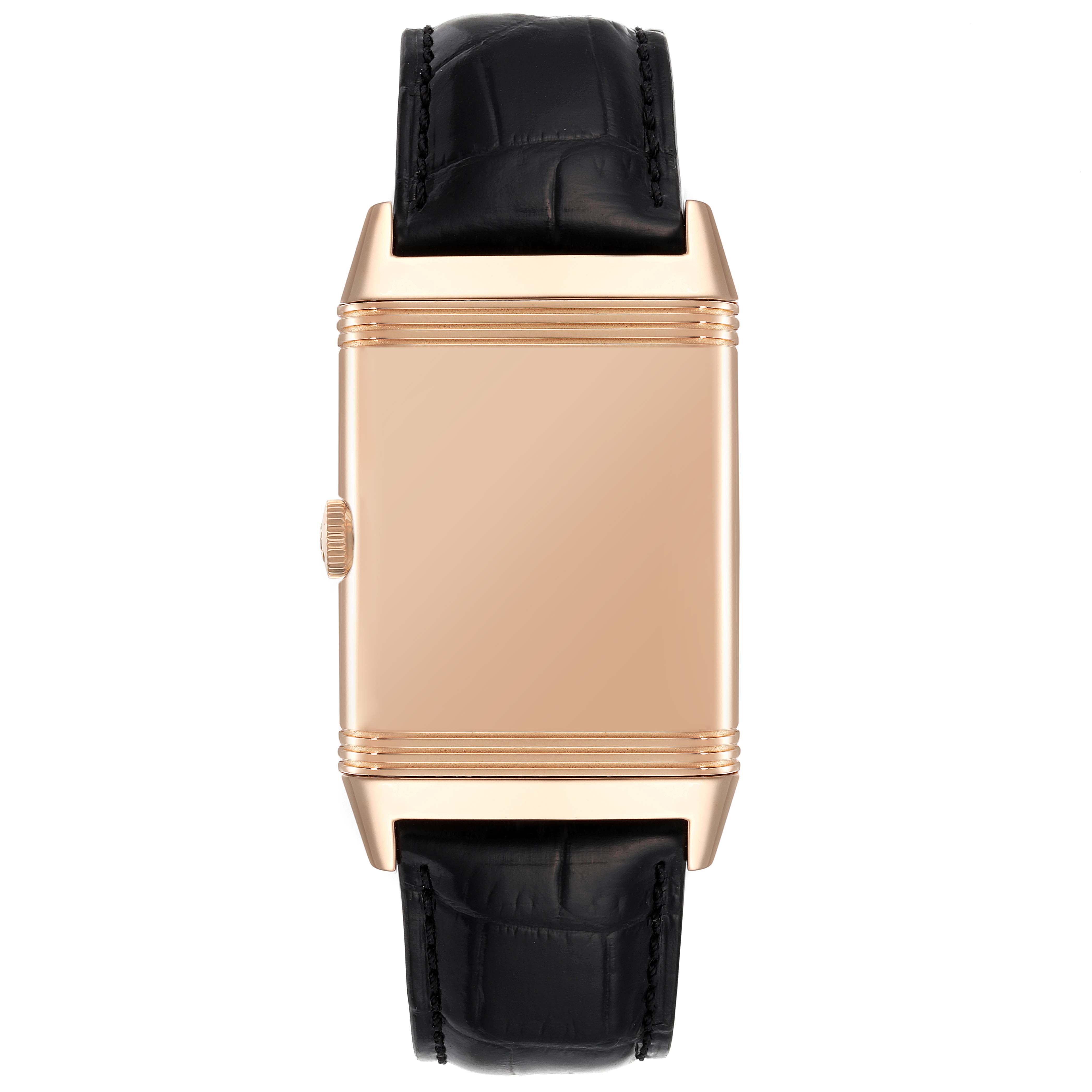 This is a front view of a Jaeger-LeCoultre Reverso watch showing the case
s back and black leather strap.