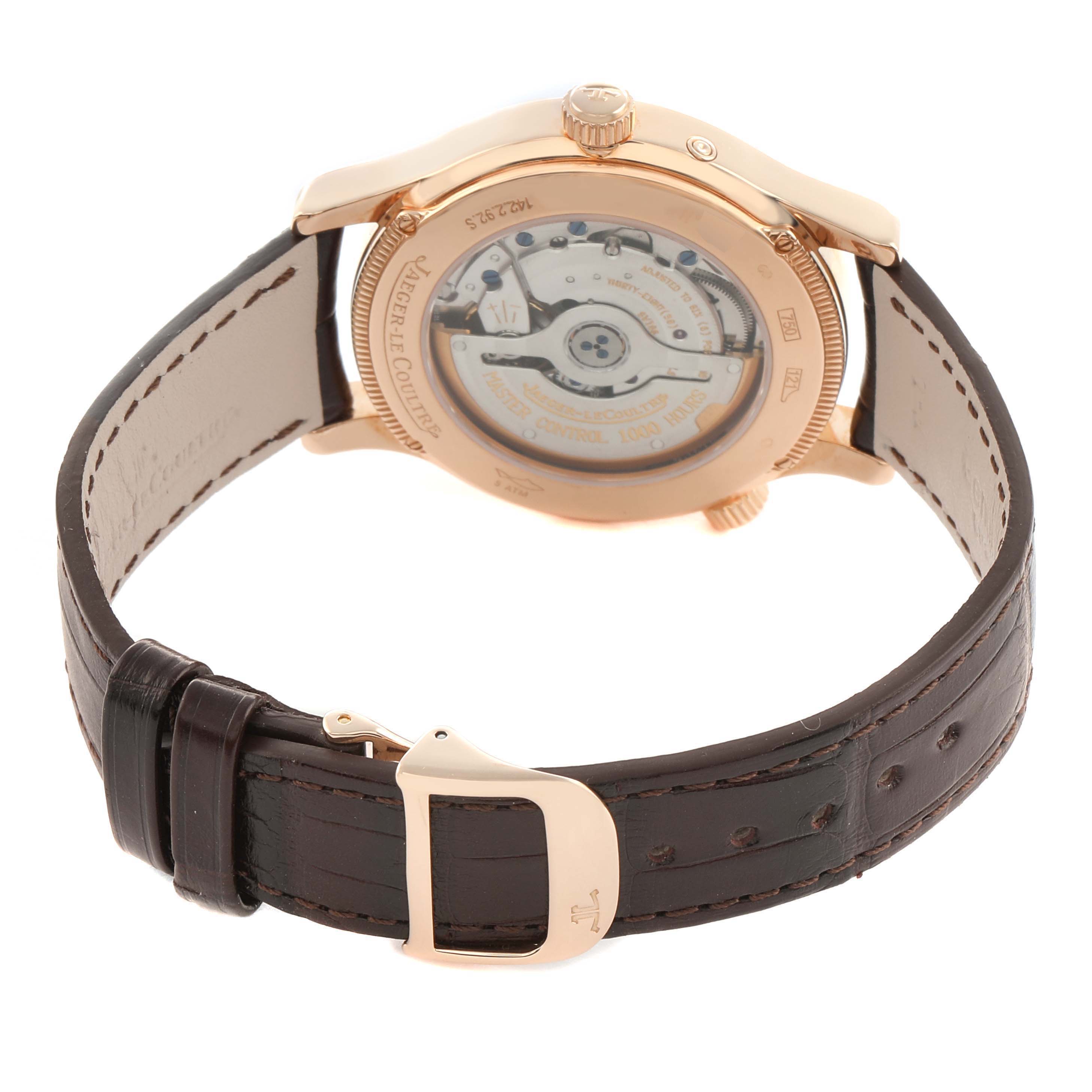 The image shows the back of a Jaeger LeCoultre Master 142.2.92.S Men's Rose Gold Black Dial watch at an angle, highlighting its transparent case back and leather strap.