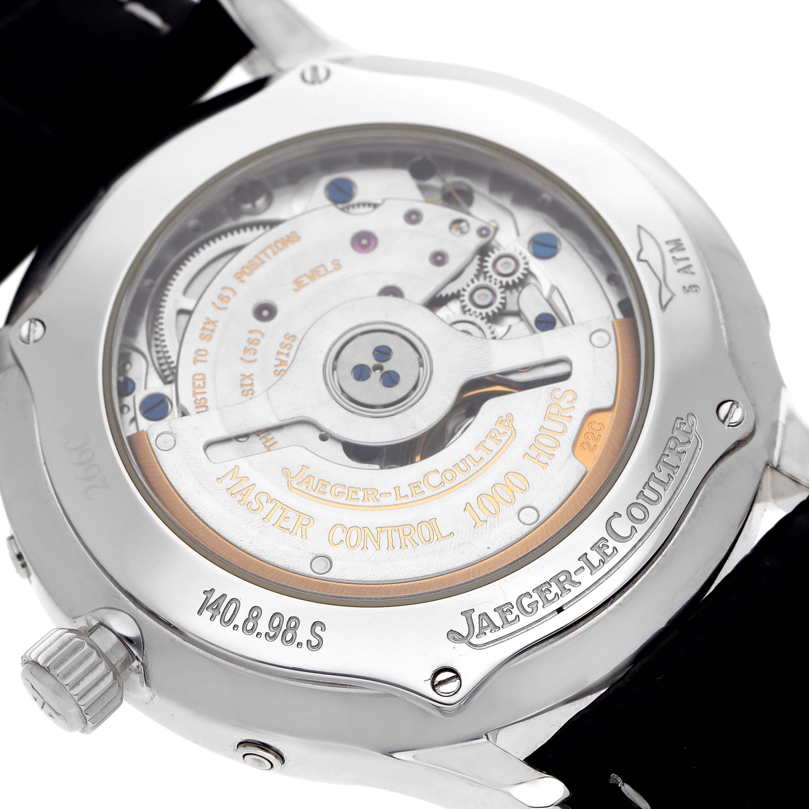 The image shows the back of a Jaeger-LeCoultre Master model, highlighting the movement and engravings.