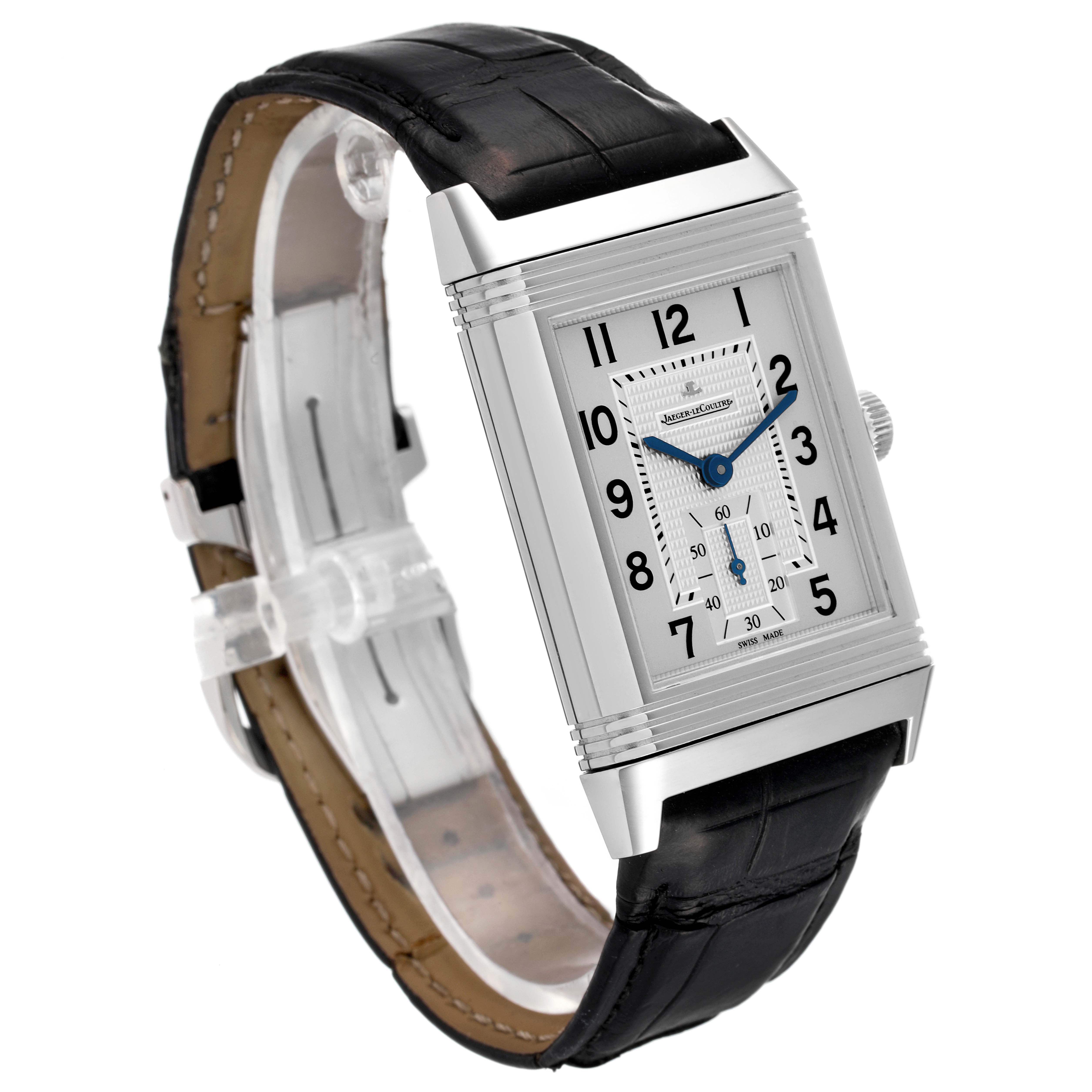 This image shows a Jaeger-LeCoultre Reverso watch at an angled front view, showcasing its rectangular dial, black leather strap, and side crown.
