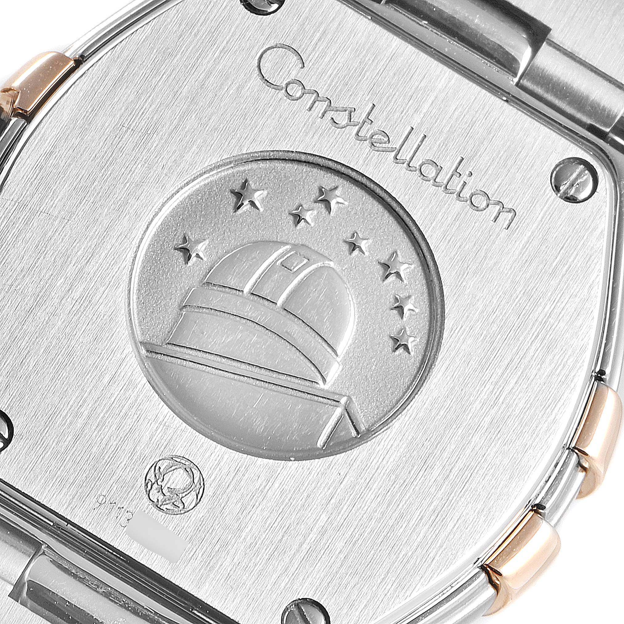 The image shows the case back of the Omega 123.25.24.60.63.001 Women's Stainless Steel Brown Dial 123.25.24.60.63.001 Women's Stainless Steel Brown Dial Constellation Diamond Steel Rose Gold Watch 123.25.24.60.63.001 with engraving. 
