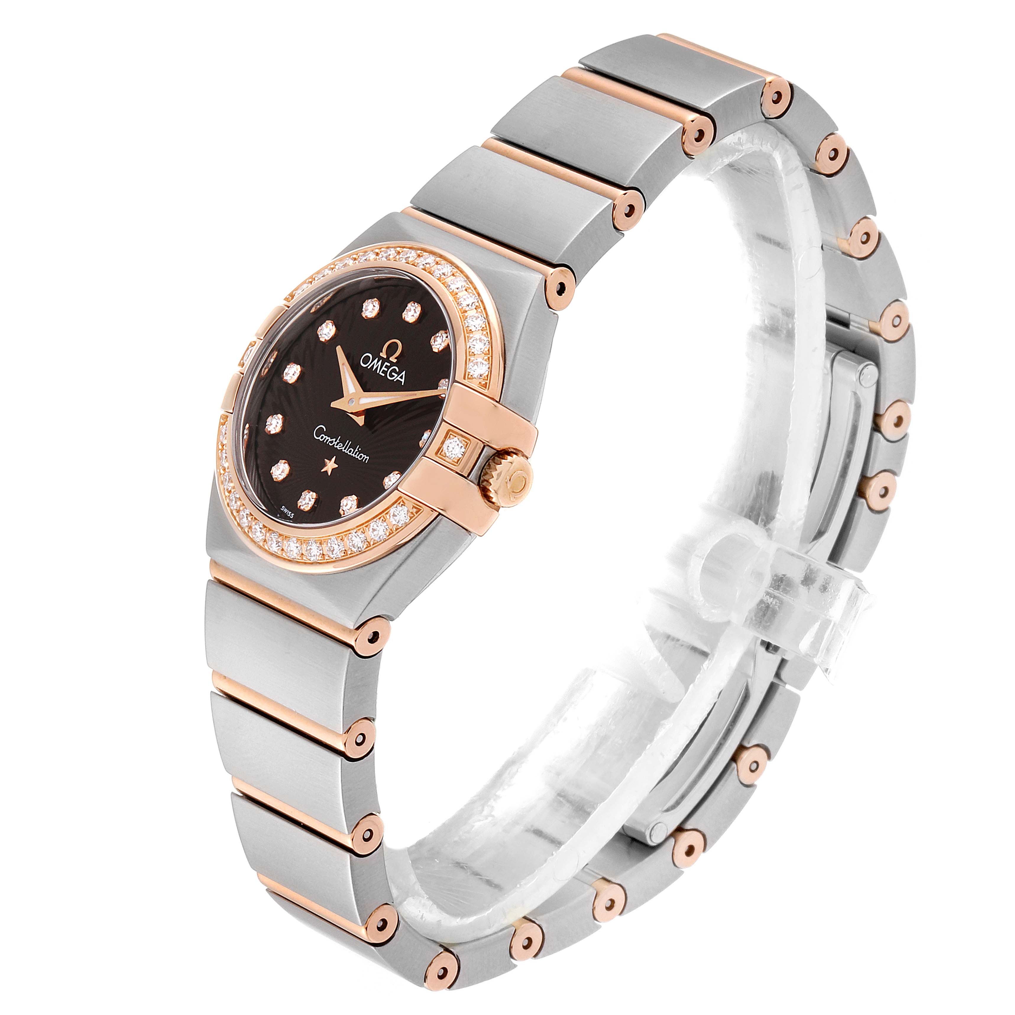 This image shows an angled view of the Omega 123.25.24.60.63.001 Women's Stainless Steel Brown Dial 123.25.24.60.63.001 Women's Stainless Steel Brown Dial Constellation Diamond Steel Rose Gold Watch 123.25.24.60.63.001, highlighting the bezel, dial, and bracelet.