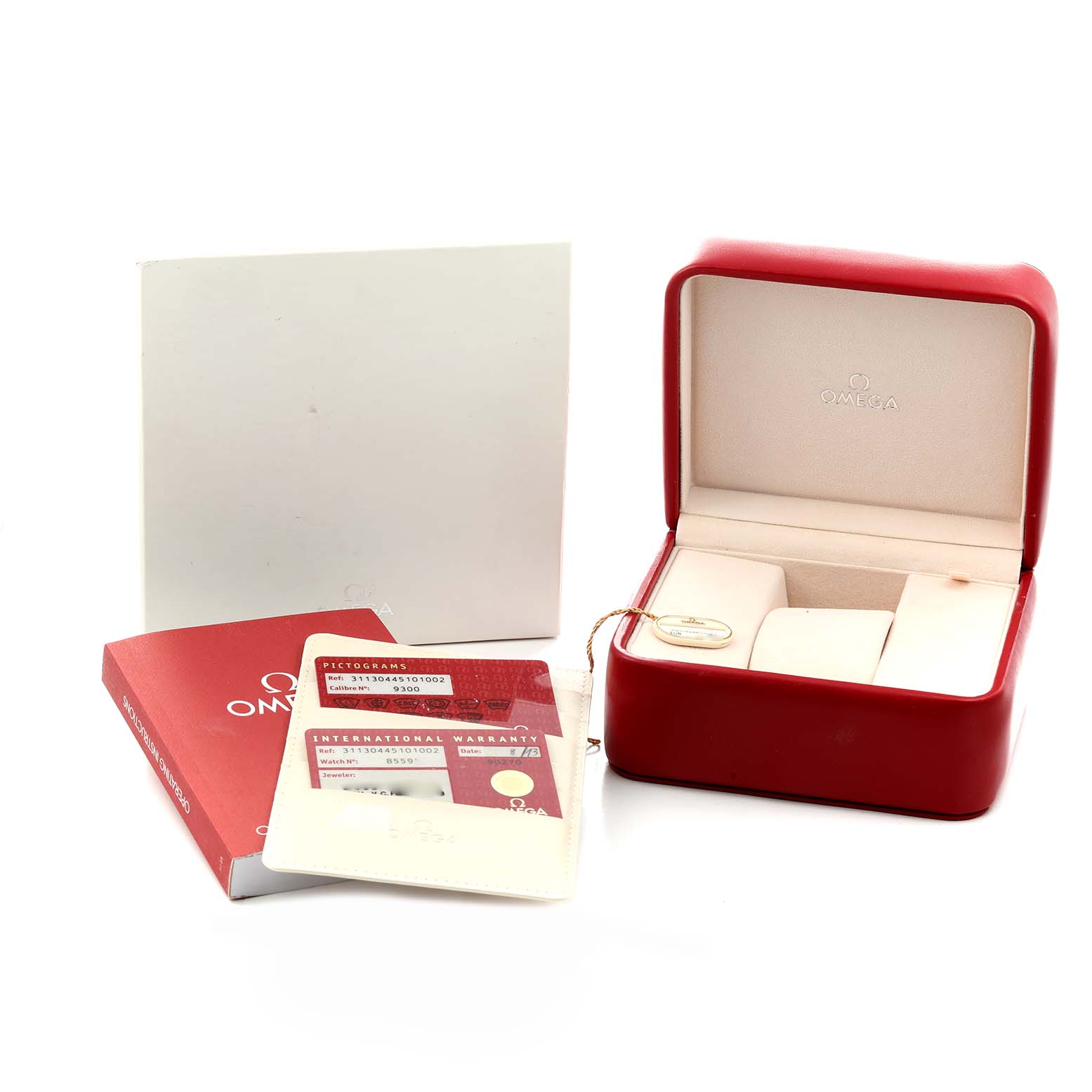 The image shows a red Omega Speedmaster 311.30.44.51.01.002 Men's Stainless Steel Black Dial watch box, warranty card, and instruction manuals.