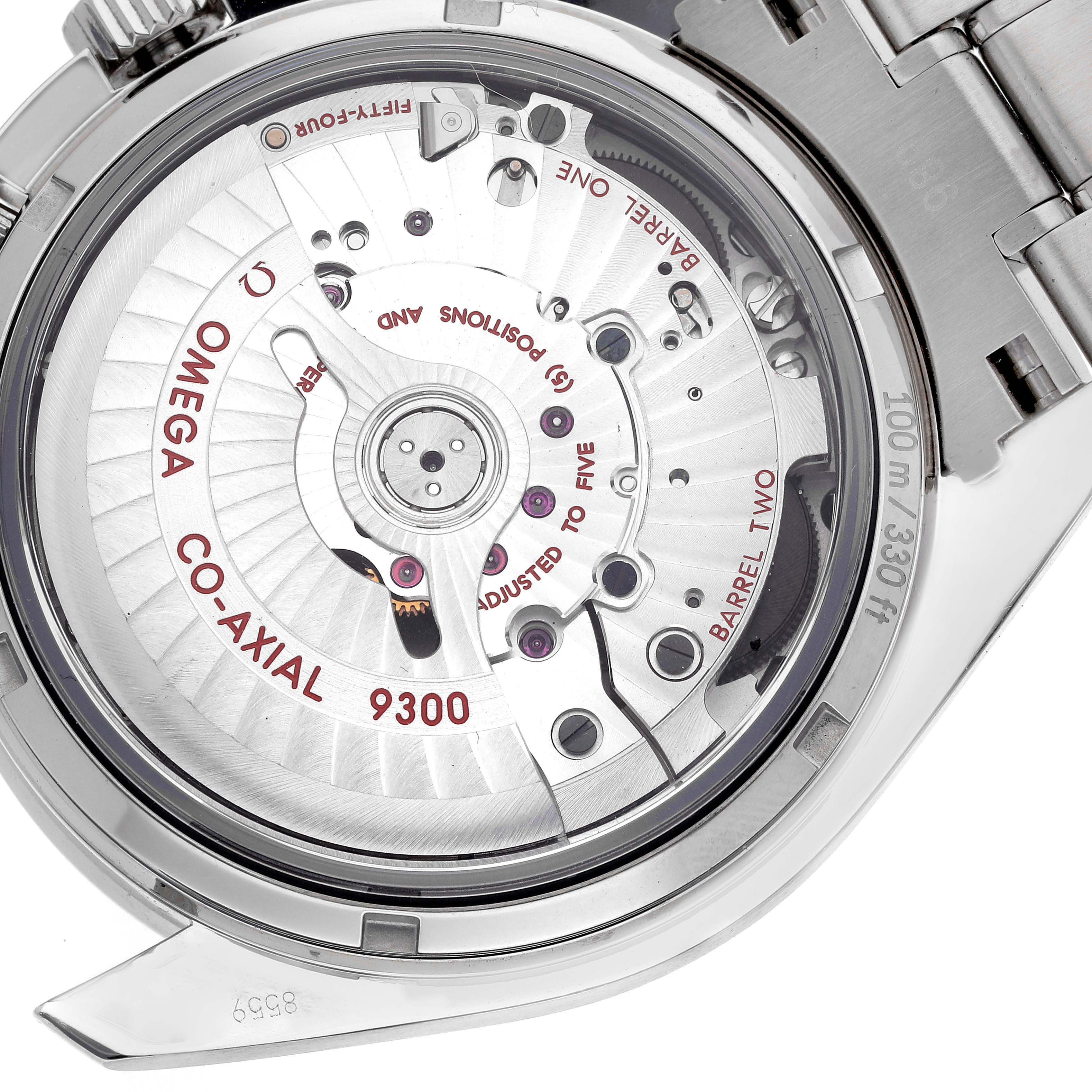 The image shows the case back of an Omega Speedmaster 311.30.44.51.01.002 Men's Stainless Steel Black Dial, focusing on the Co-Axial 9300 movement.