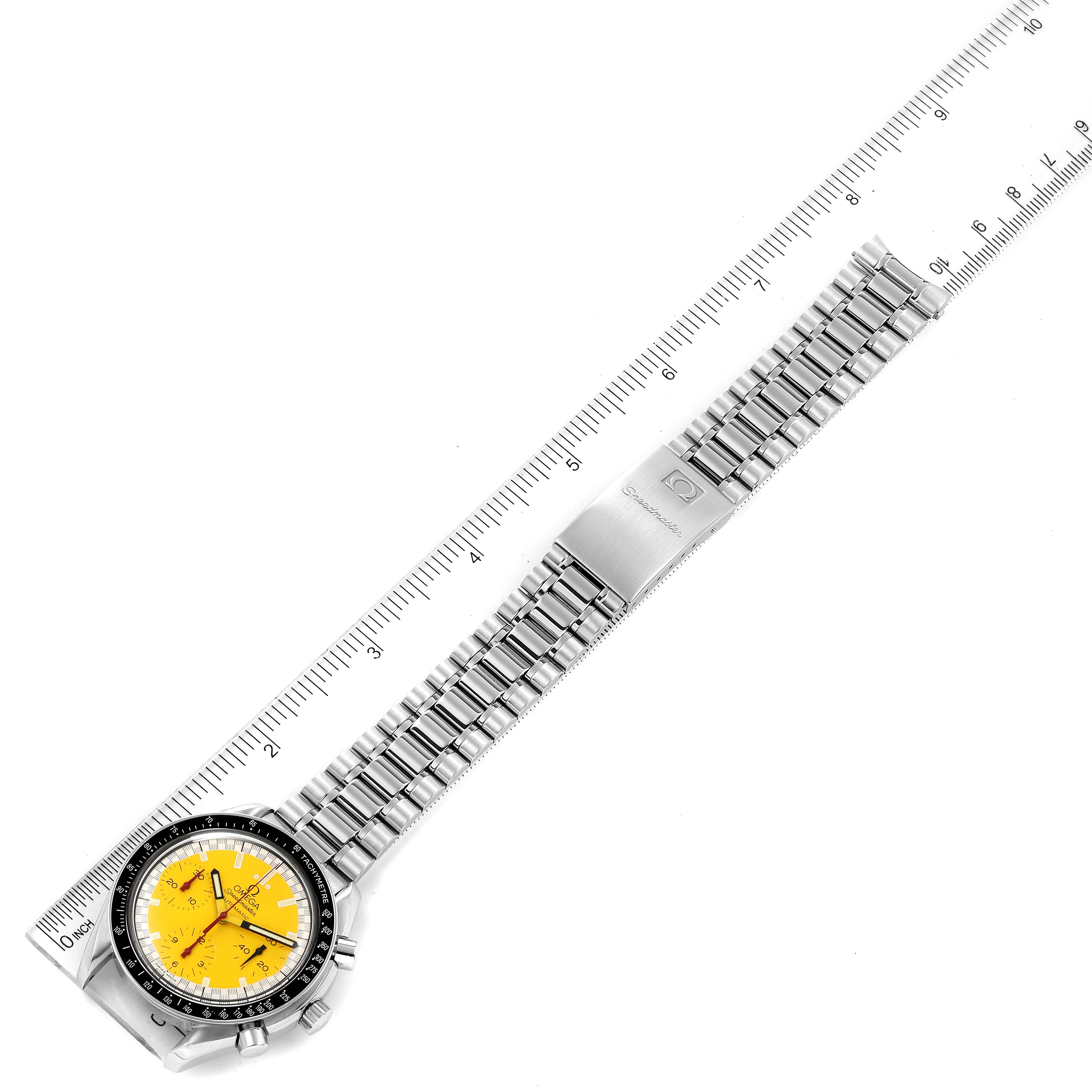 The Omega Speedmaster 3510.12.00 Men's Stainless Steel Yellow Dial 3510.12.00 Men's Stainless Steel Yellow Dial watch is shown from a top-down angle, featuring its yellow dial, bezel, and metal bracelet with a clasp displaying the logo.