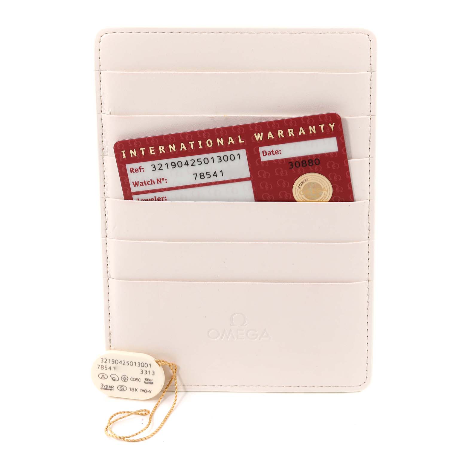 The image shows an Omega Speedmaster 321.90.42.50.13.001 Men's Steel and Gold (two tone) Brown Dial 321.90.42.50.13.001 Men's Steel and Gold (two tone) Brown Dial model warranty card and a tag, both placed in a white Omega card holder.