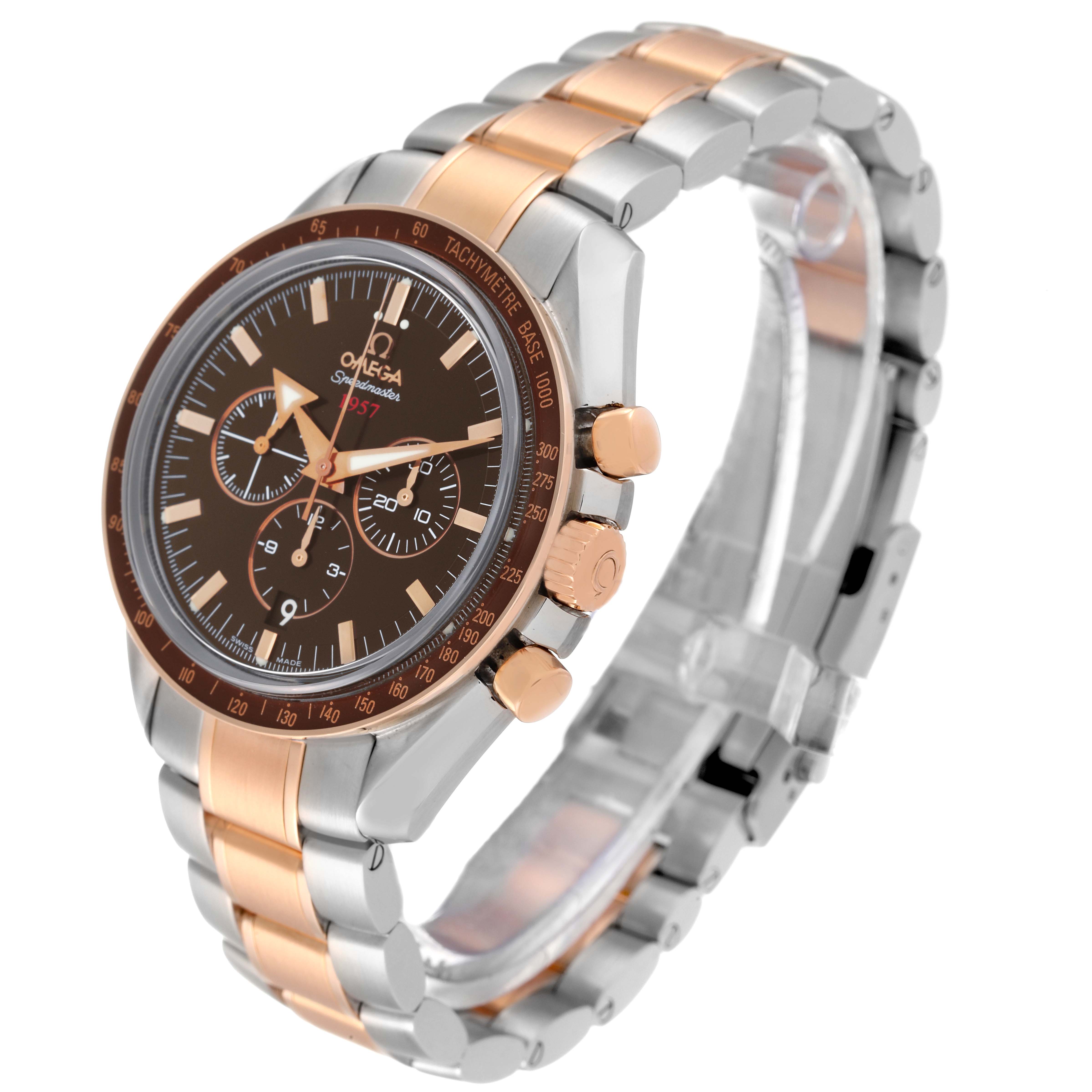 The image shows an angled view of the Omega Speedmaster 321.90.42.50.13.001 Men's Steel and Gold (two tone) Brown Dial 321.90.42.50.13.001 Men's Steel and Gold (two tone) Brown Dial watch, highlighting its dial, bezel, case, crown, and two-tone bracelet.