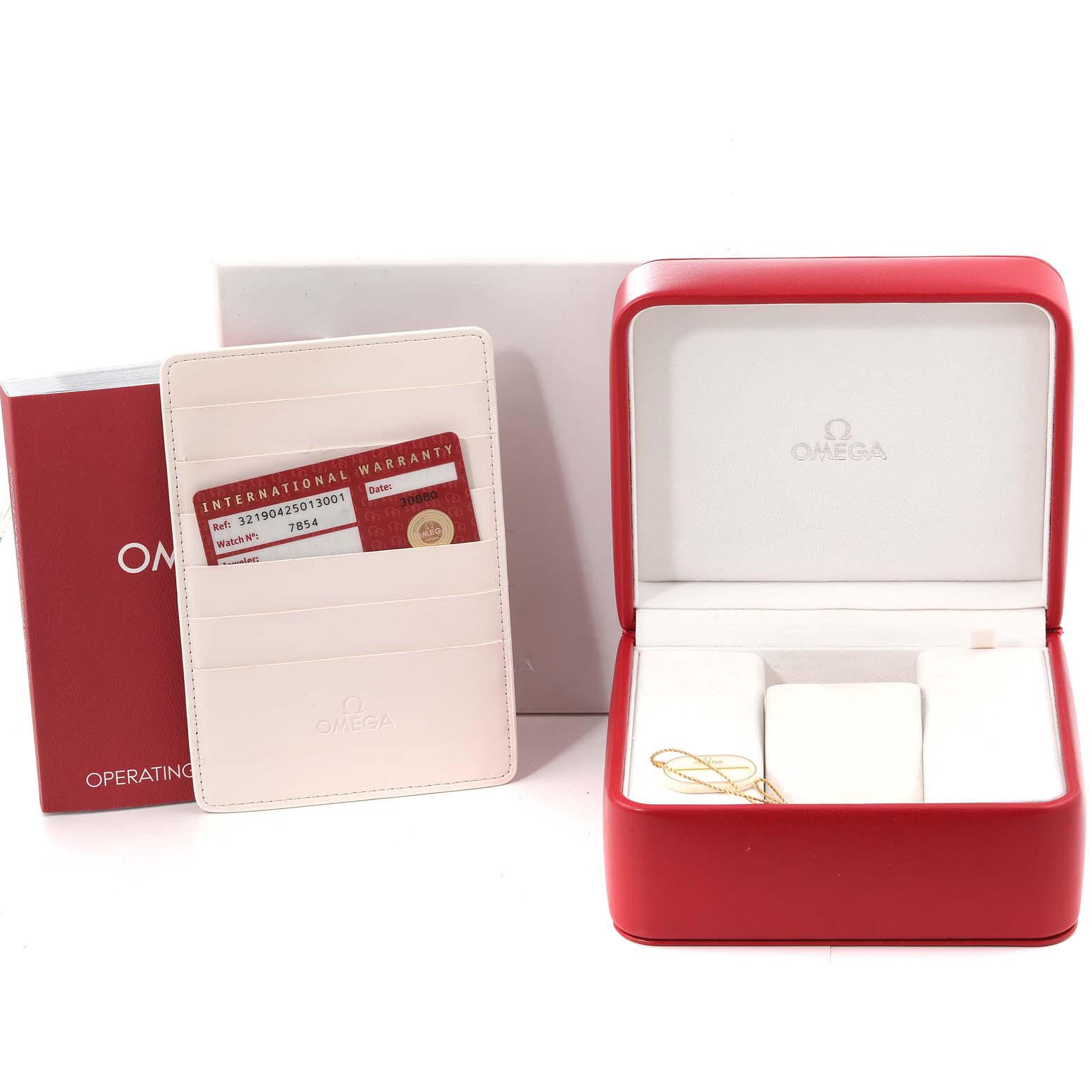 This image shows the packaging and accessories for an Omega Speedmaster 321.90.42.50.13.001 Men's Steel and Gold (two tone) Brown Dial 321.90.42.50.13.001 Men's Steel and Gold (two tone) Brown Dial watch, including the box, warranty card, and operating instructions.