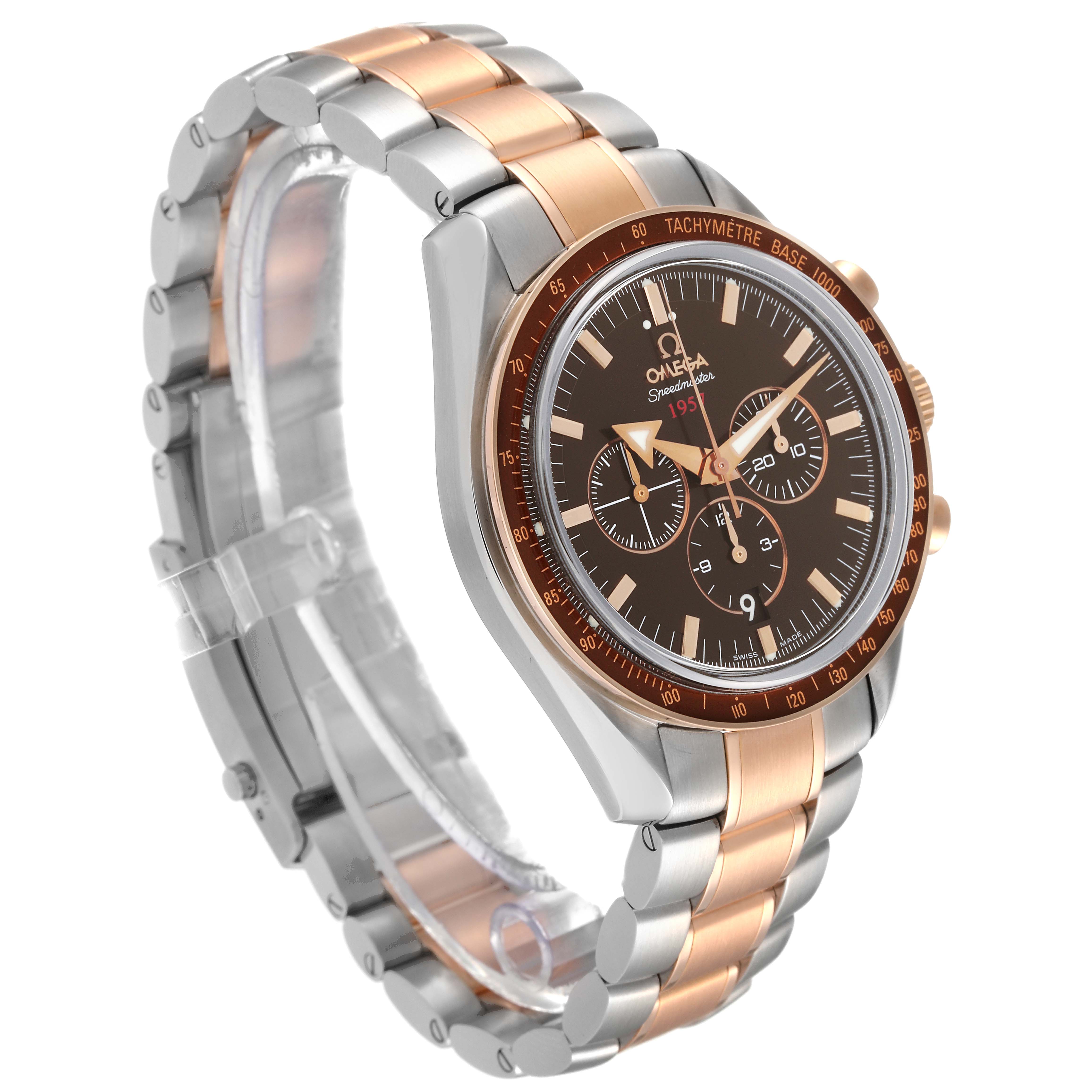 This Omega Speedmaster 321.90.42.50.13.001 Men's Steel and Gold (two tone) Brown Dial 321.90.42.50.13.001 Men's Steel and Gold (two tone) Brown Dial watch is shown at an oblique angle, featuring its two-tone bracelet and detailed dial.
