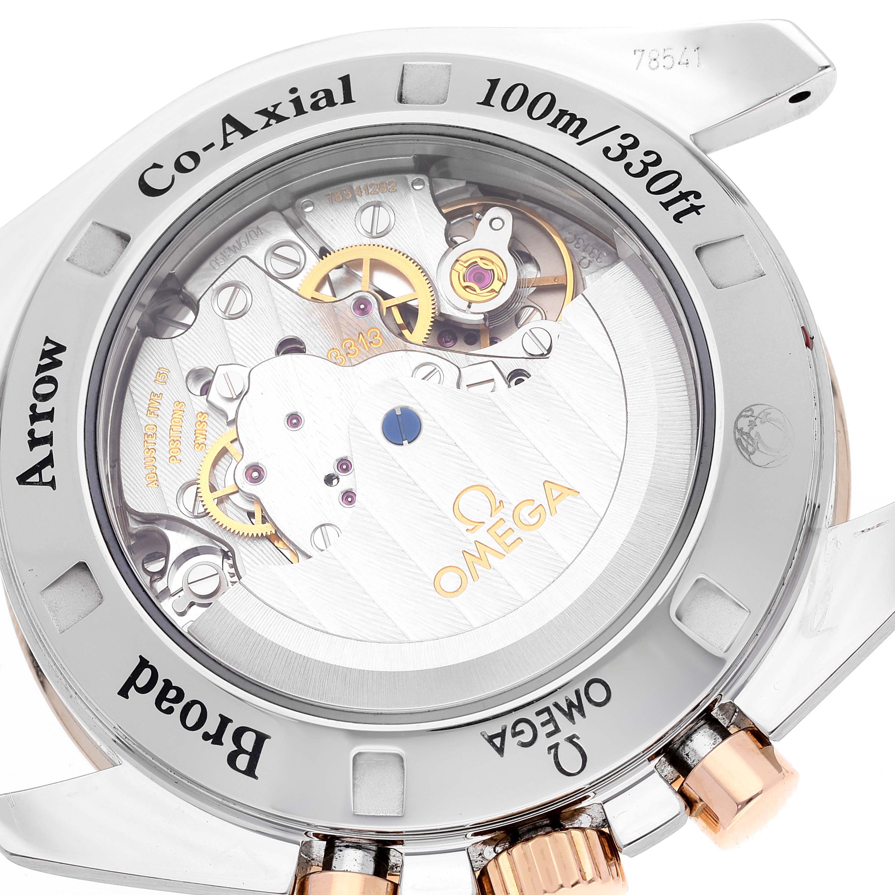 This image shows the back view of the Omega Speedmaster 321.90.42.50.13.001 Men's Steel and Gold (two tone) Brown Dial 321.90.42.50.13.001 Men's Steel and Gold (two tone) Brown Dial, highlighting the watch's inner movement and rear casing details.