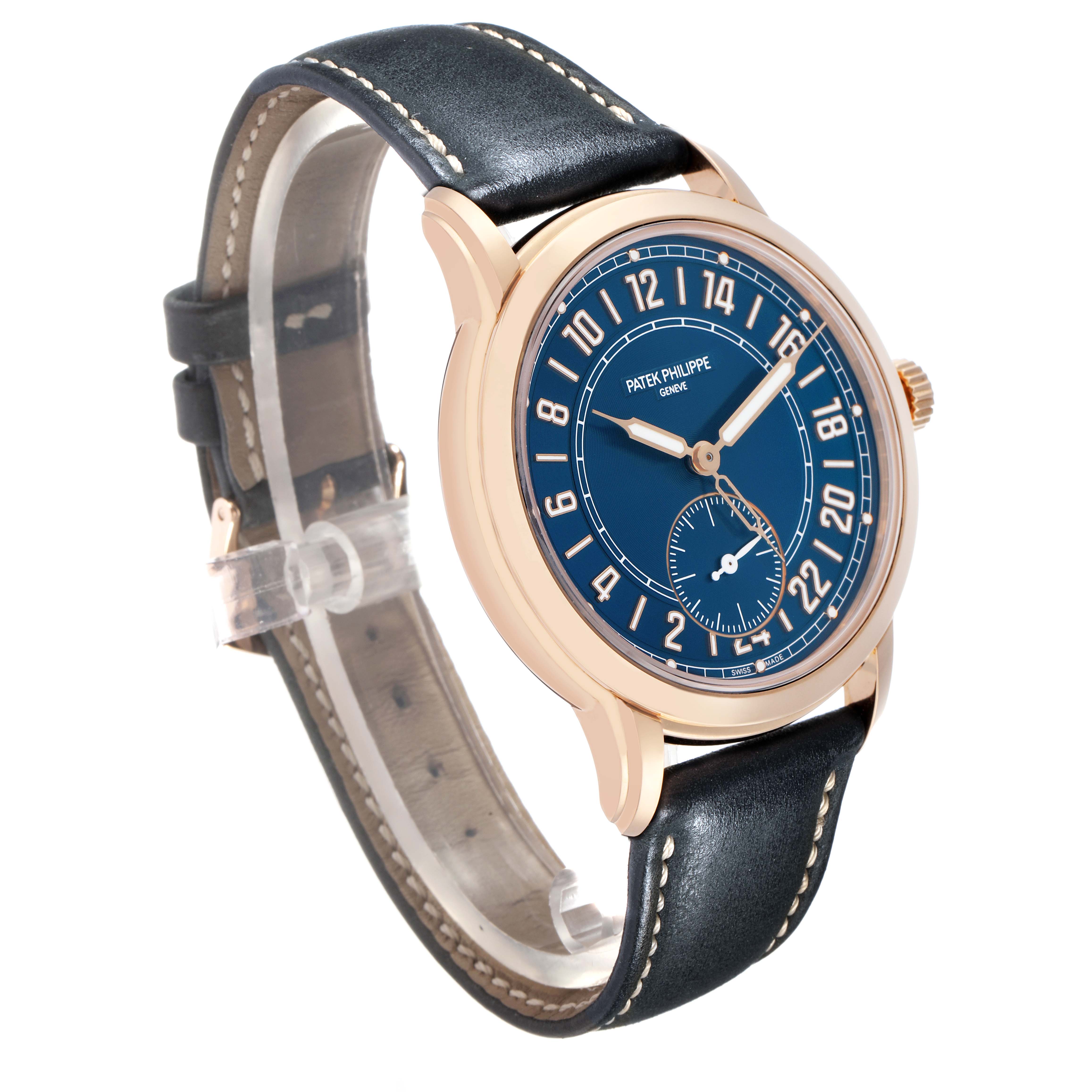 The Patek Philippe Calatrava 5224R-001 Men's Rose Gold Blue Dial is shown at a three-quarter angle, displaying the face, rose gold case, and leather strap.