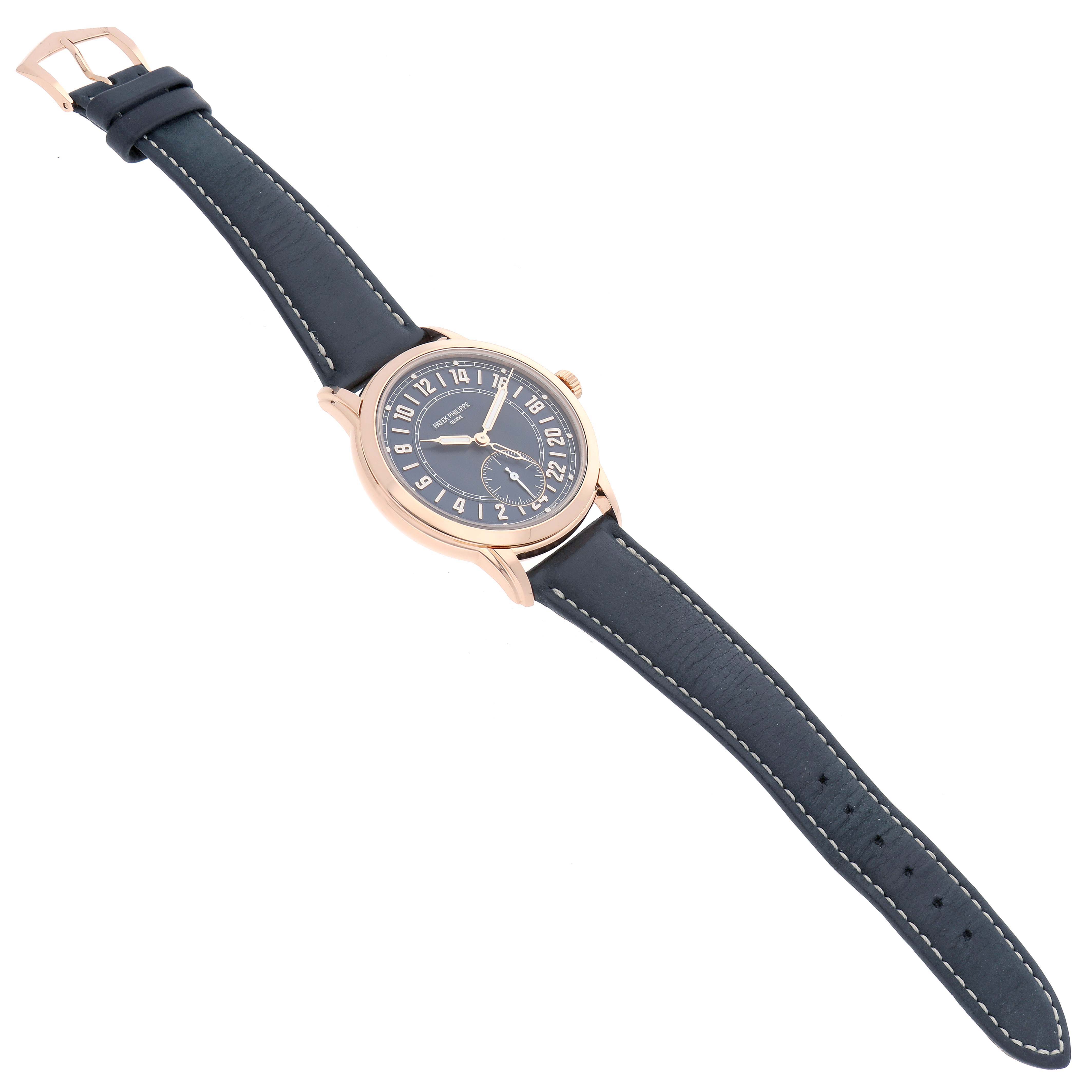 The Patek Philippe Calatrava 5224R-001 Men's Rose Gold Blue Dial is shown from a top angle, featuring its dial, case, and full leather strap.