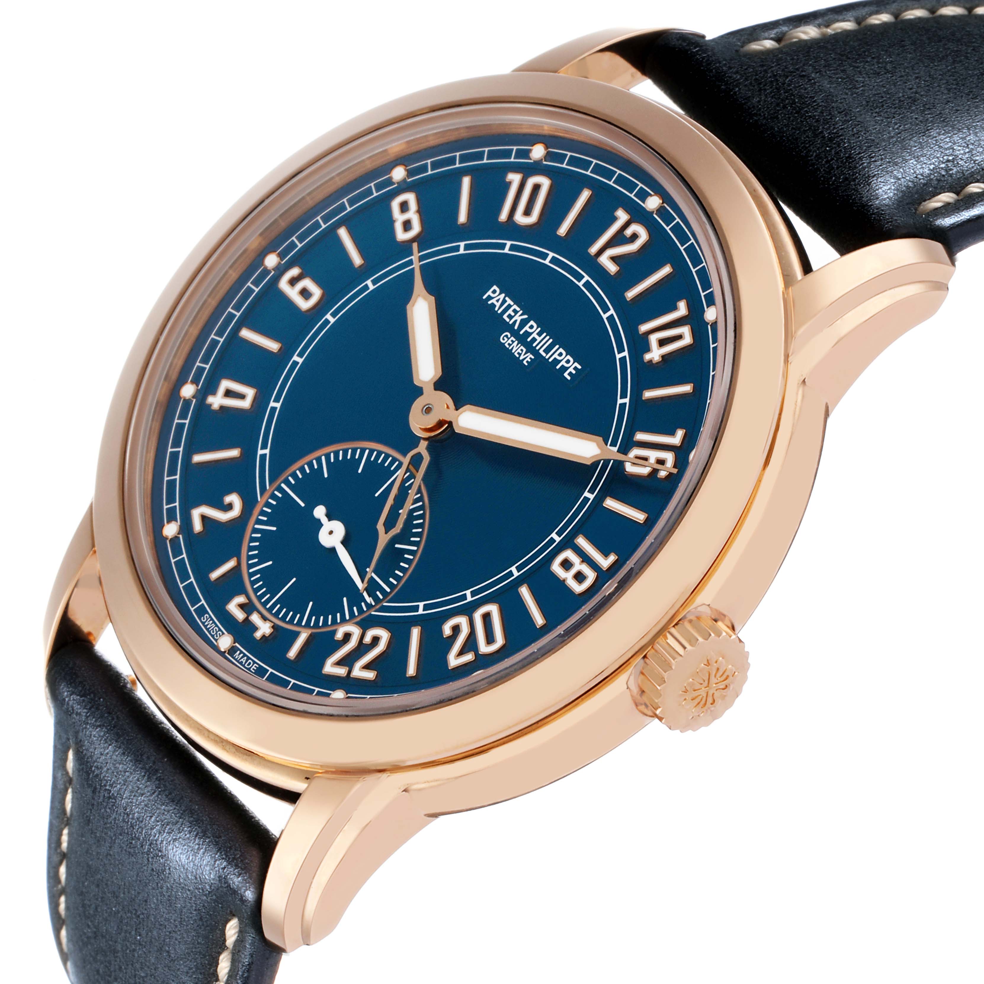 The Patek Philippe Calatrava 5224R-001 Men's Rose Gold Blue Dial watch is shown at a slight side angle, displaying the face, crown, and part of the leather strap.