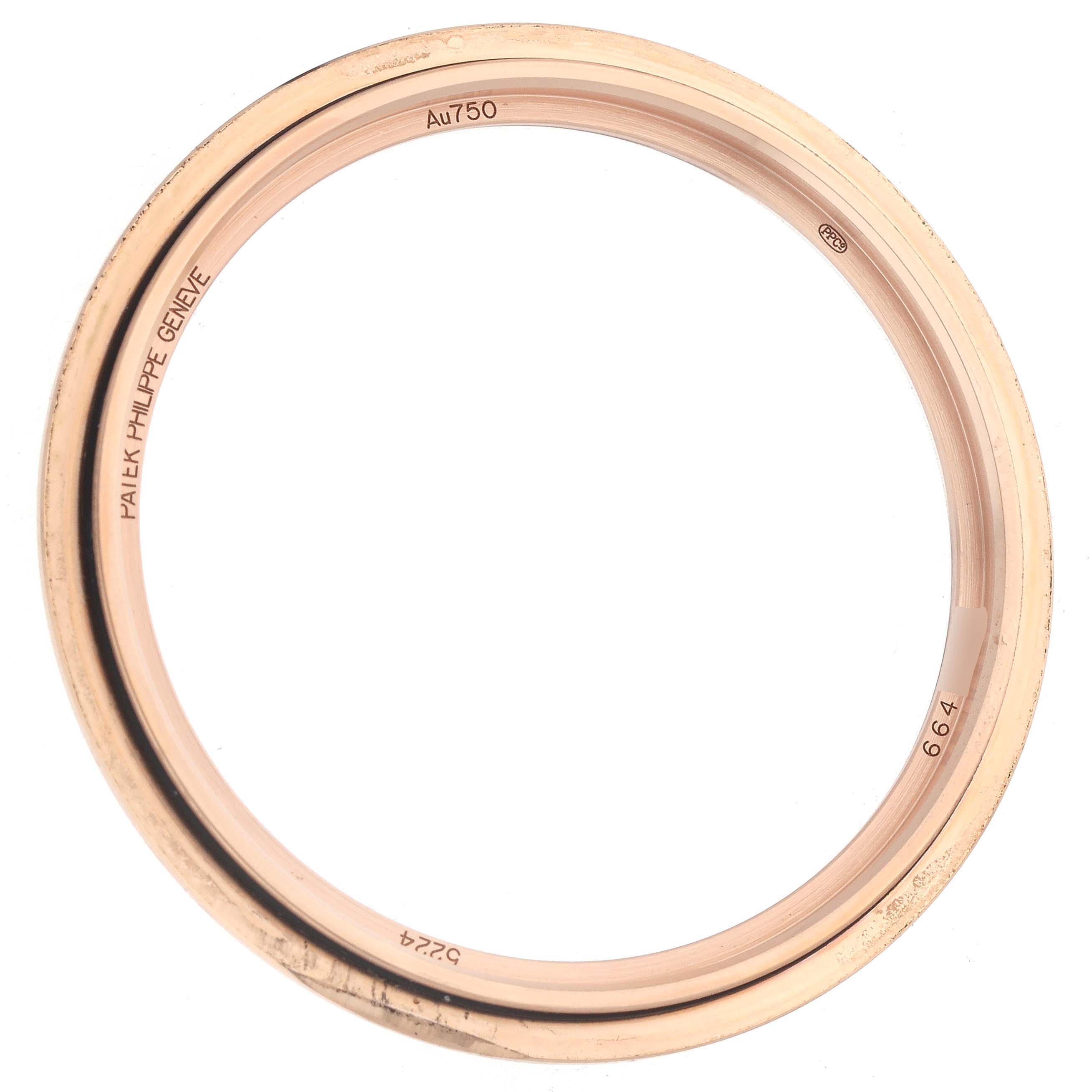 The image shows a rose gold bezel from a Patek Philippe Calatrava 5224R-001 Men's Rose Gold Blue Dial watch viewed from above.