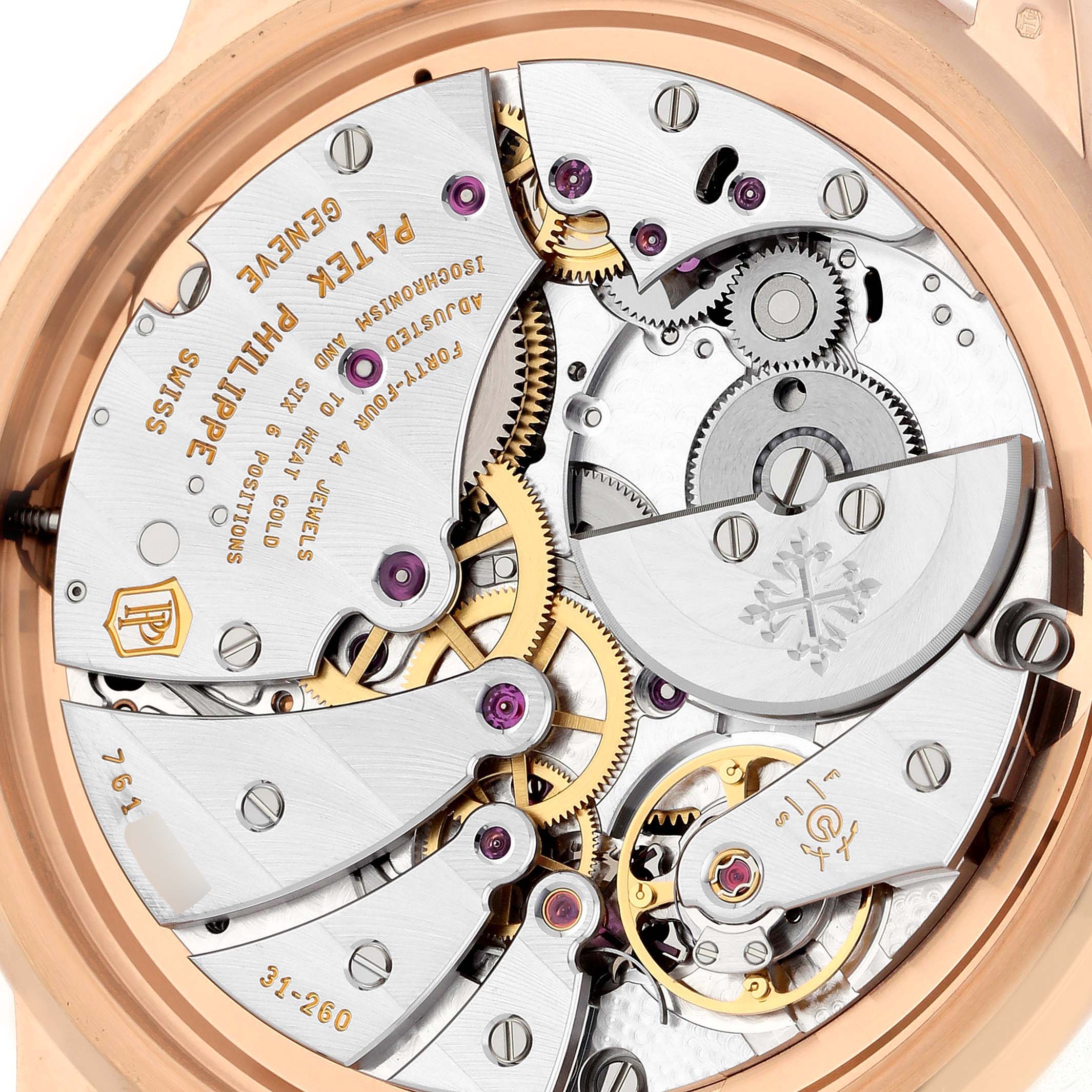 The image shows the back view of a Patek Philippe Calatrava 5224R-001 Men's Rose Gold Blue Dial watch, displaying its intricate mechanical movement.