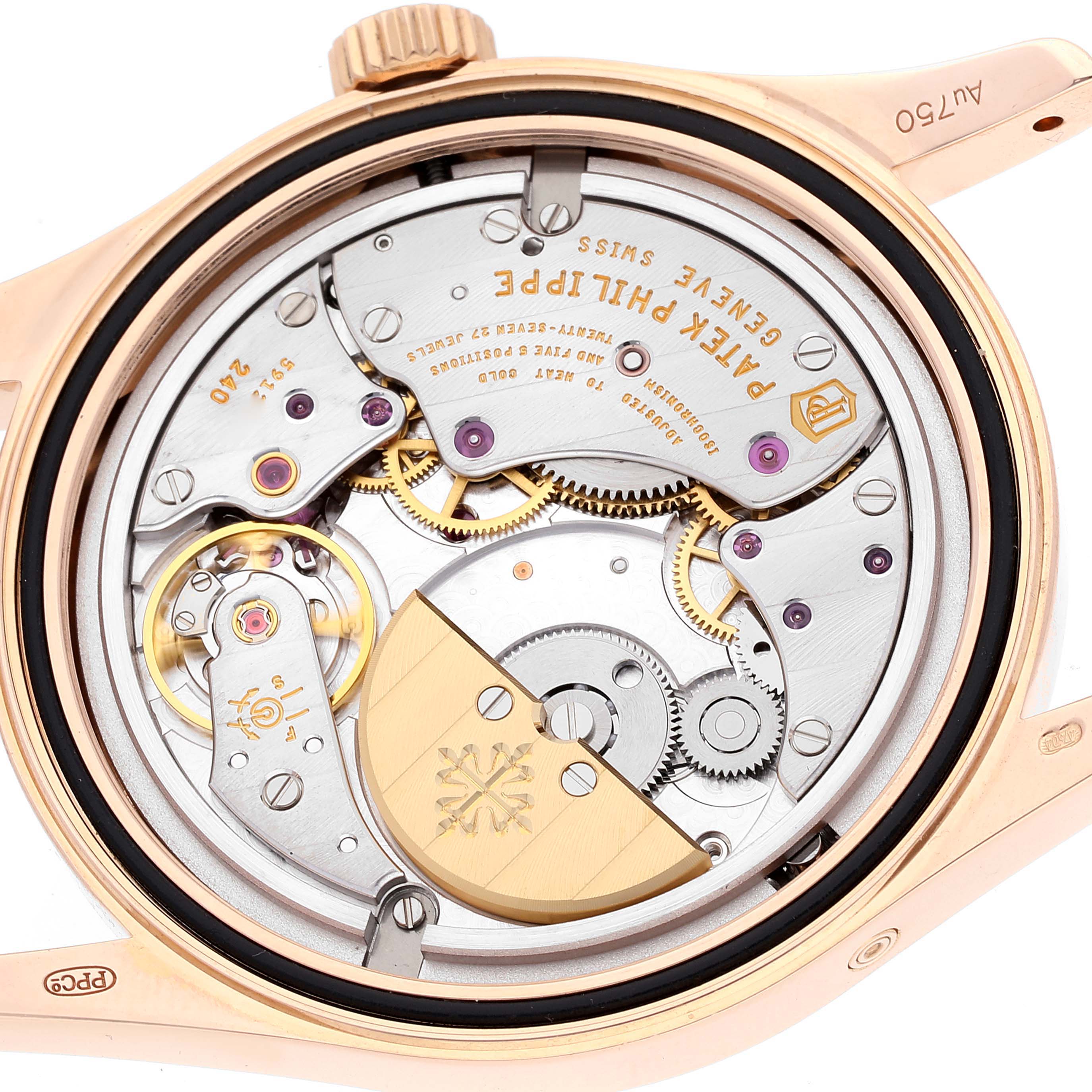 The image shows the back view of the Patek Philippe Calatrava 6000R-001 Men's Rose Gold Brown Dial 6000R-001 Men's Rose Gold Brown Dial watch, focusing on its intricate mechanical movement.