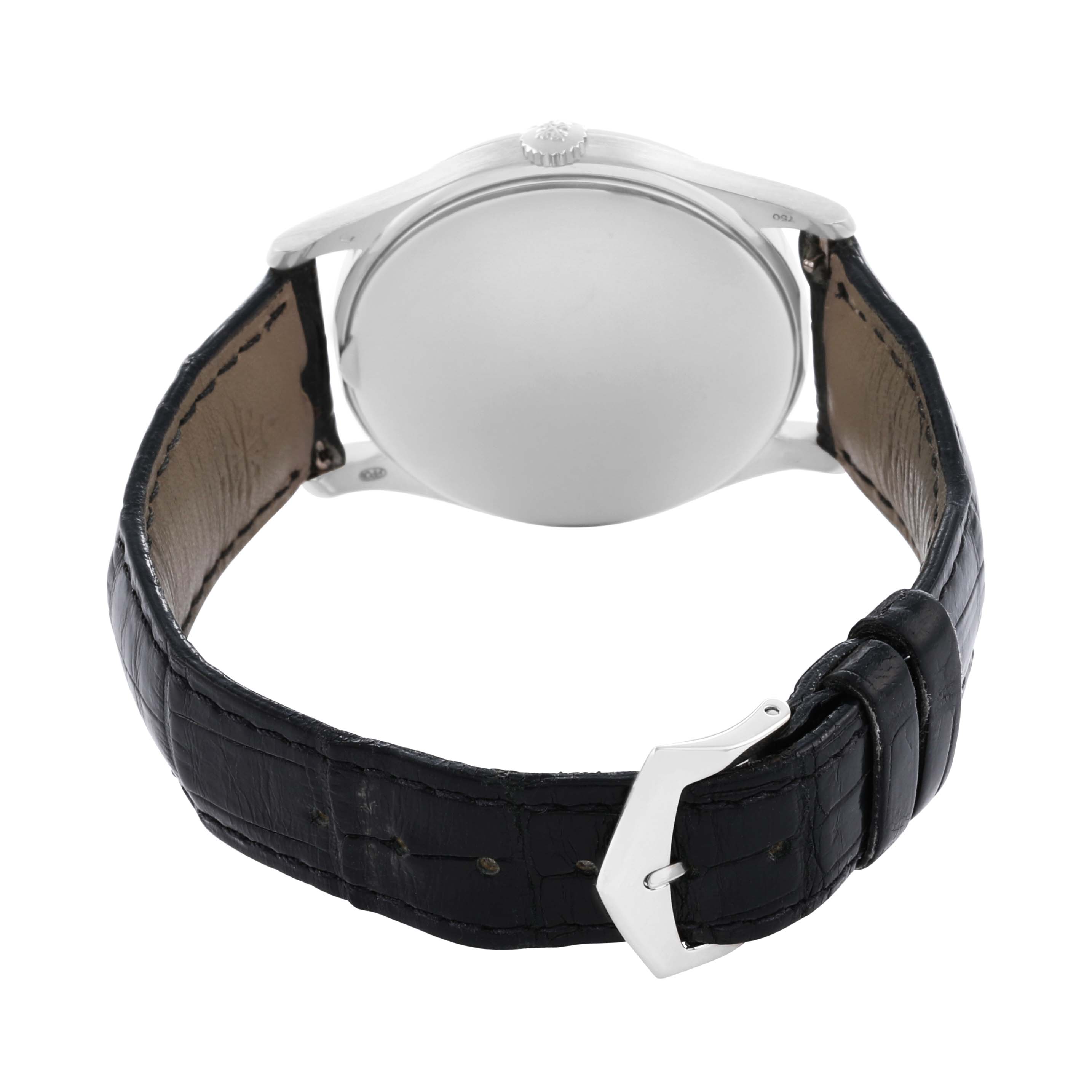 The image shows the back case and strap of a Patek Philippe Calatrava 5196 Men
s White Gold Silver Dial watch at an angle highlighting the buckle and texture.