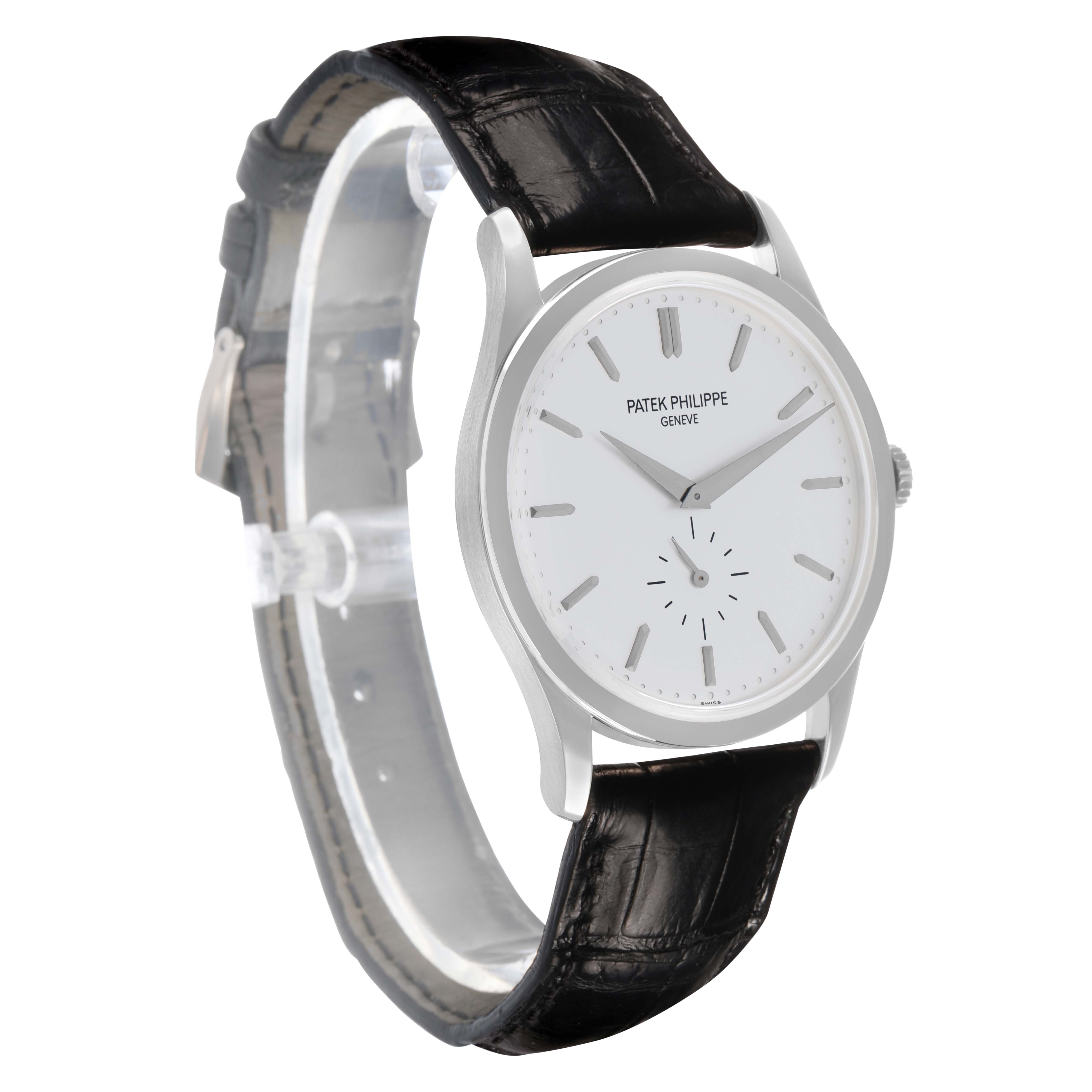 The Patek Philippe Calatrava 5196 Men
s White Gold Silver Dial watch is shown at a three-quarter angle, highlighting the dial, case, and leather strap.