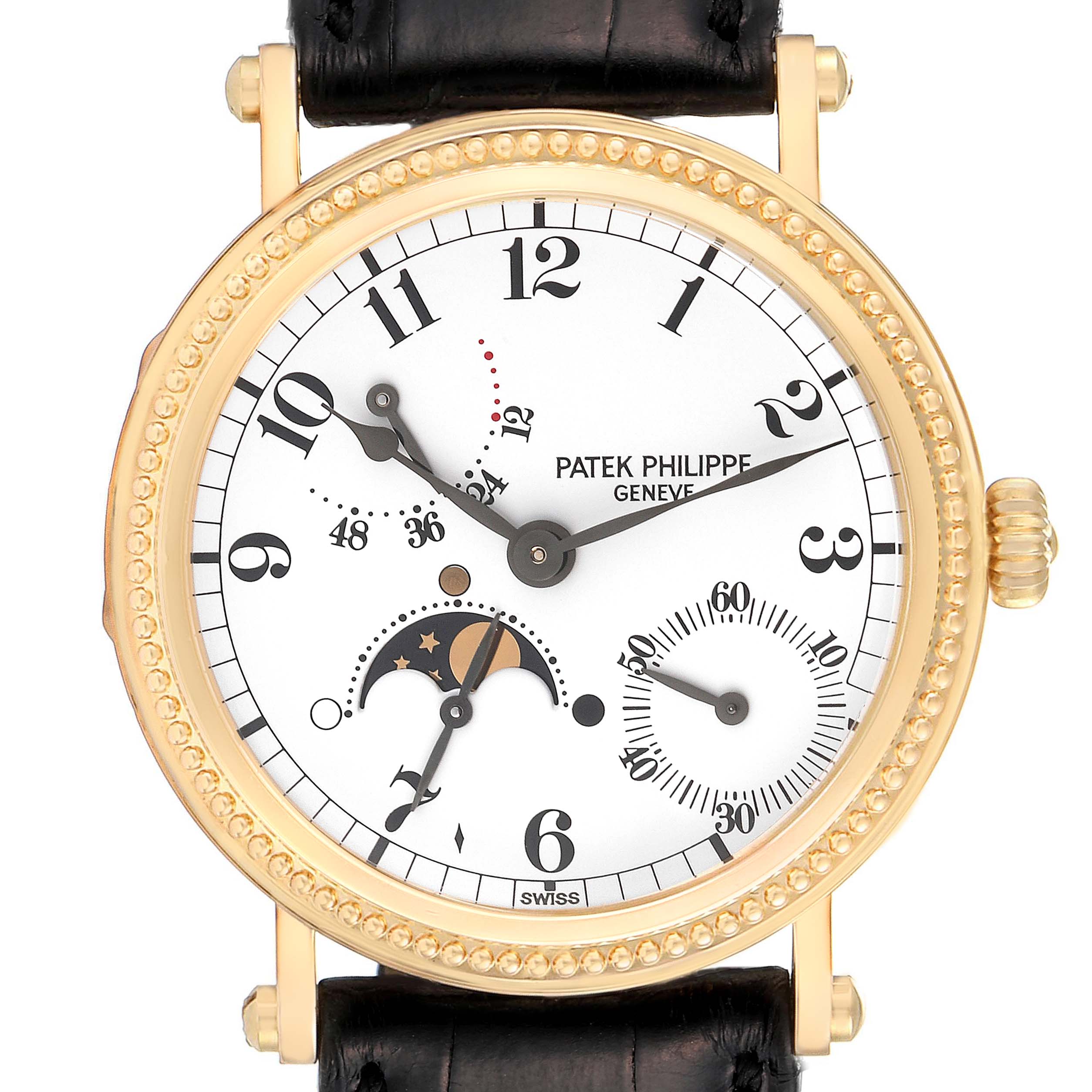 The Calatrava model by Patek Philippe is shown from the front, featuring a white dial, Arabic numerals, moon phase, and subdials.