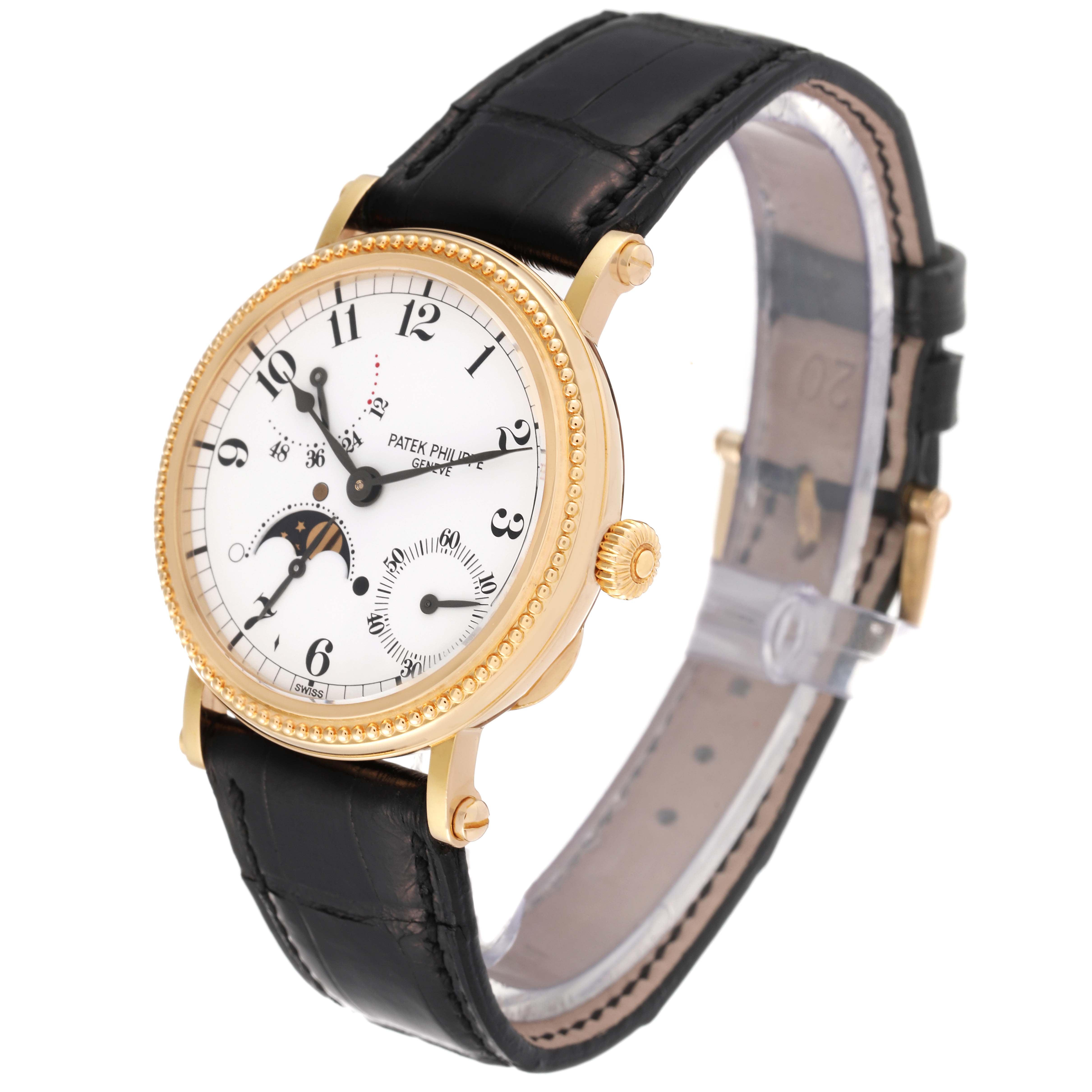 The image shows a side-angle view of a Patek Philippe Calatrava 5015J-001 Men
s Yellow Gold White Dial 5015J-001 Men
s Yellow Gold White Dial watch, highlighting its dial, bezel, and leather strap.