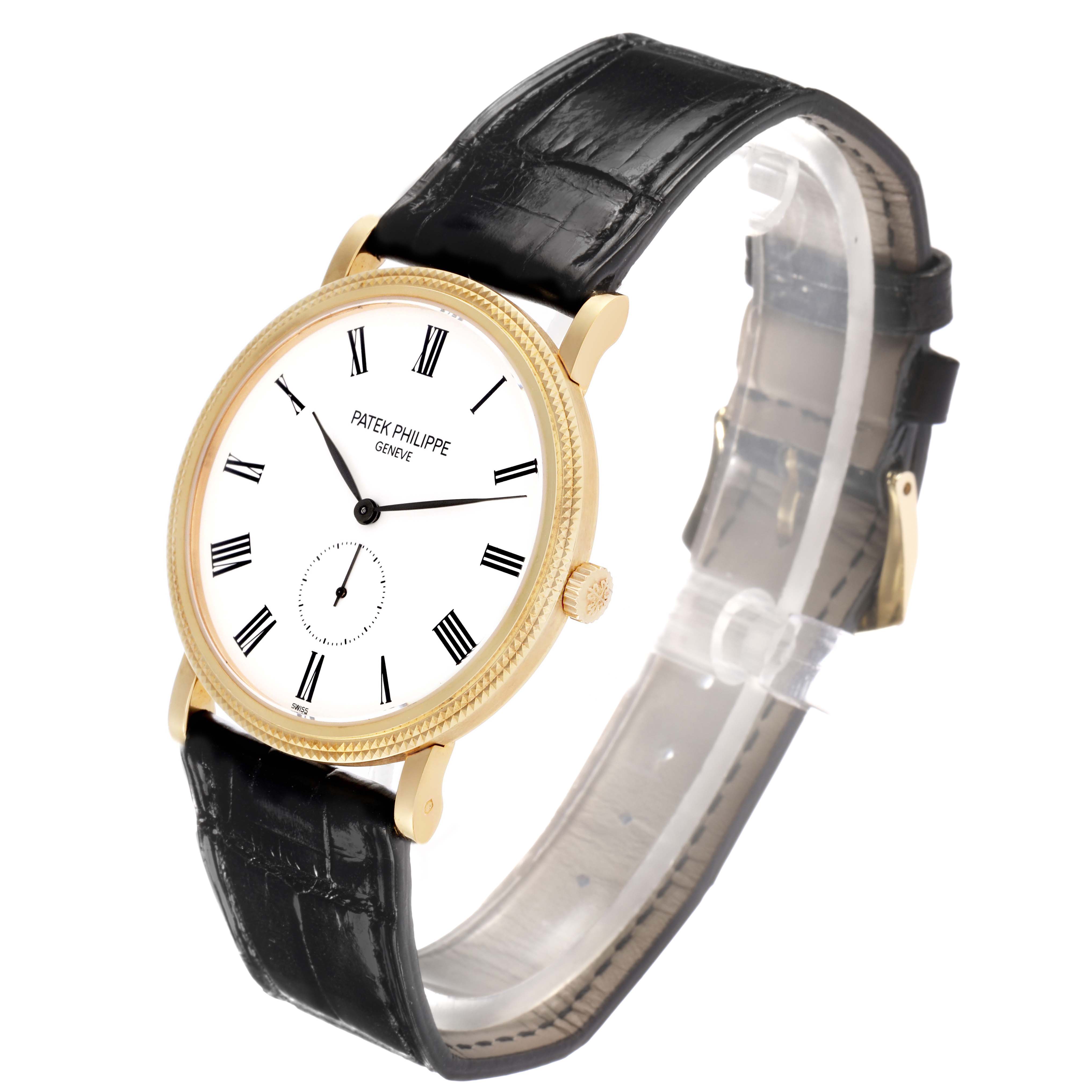 The Patek Philippe Calatrava 5119 Men
s Yellow Gold White Dial watch is shown at a three-quarter angle, displaying the face, crown, and leather strap.