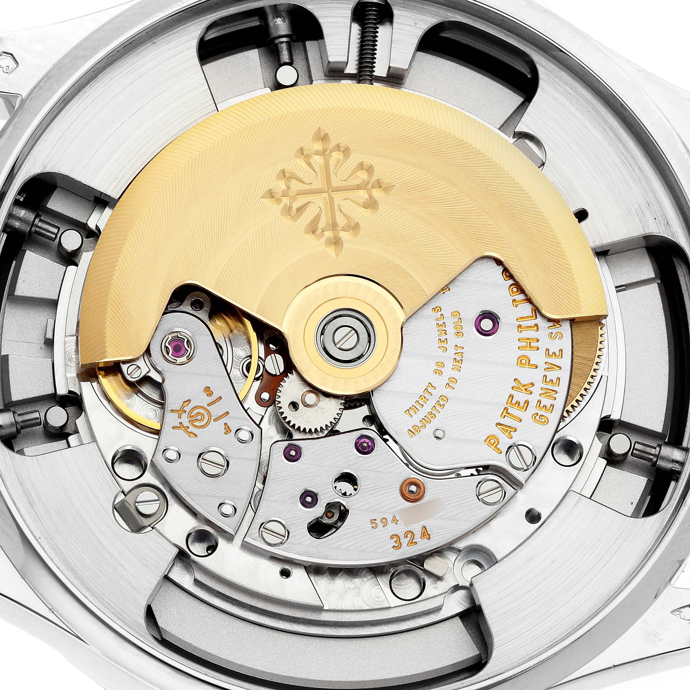 The image shows the movement of a Patek Philippe Complications 5496P-014 Men's Platinum Brown Dial watch from a top-down angle, highlighting the rotor and intricate components.