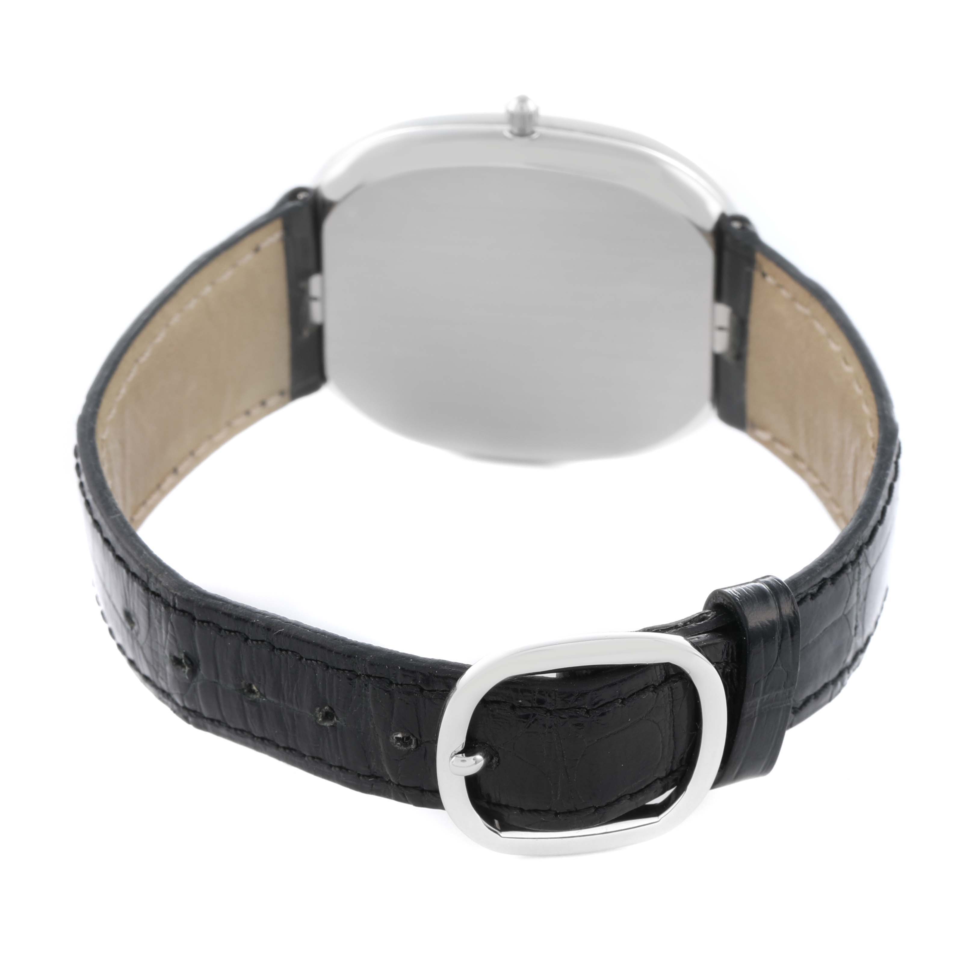 The image shows a rear angle of the Patek Philippe Golden Ellipse 5738P-001 Men's Platinum Blue Dial watch, highlighting the back case and buckle strap.