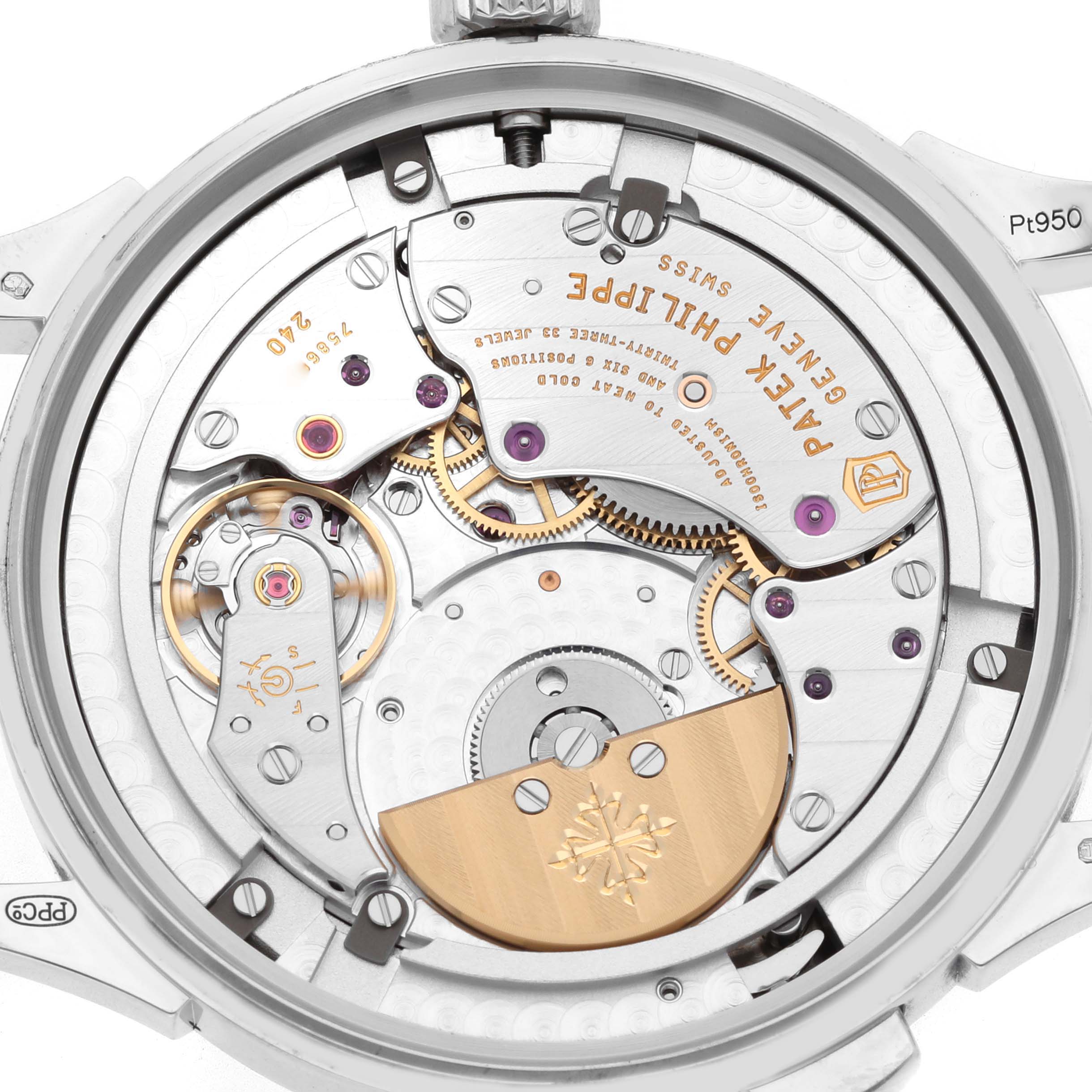 The image shows the back view of a Patek Philippe Complications 5230P-001 Men's Platinum Blue Dial model, focusing on its intricate mechanical movement.