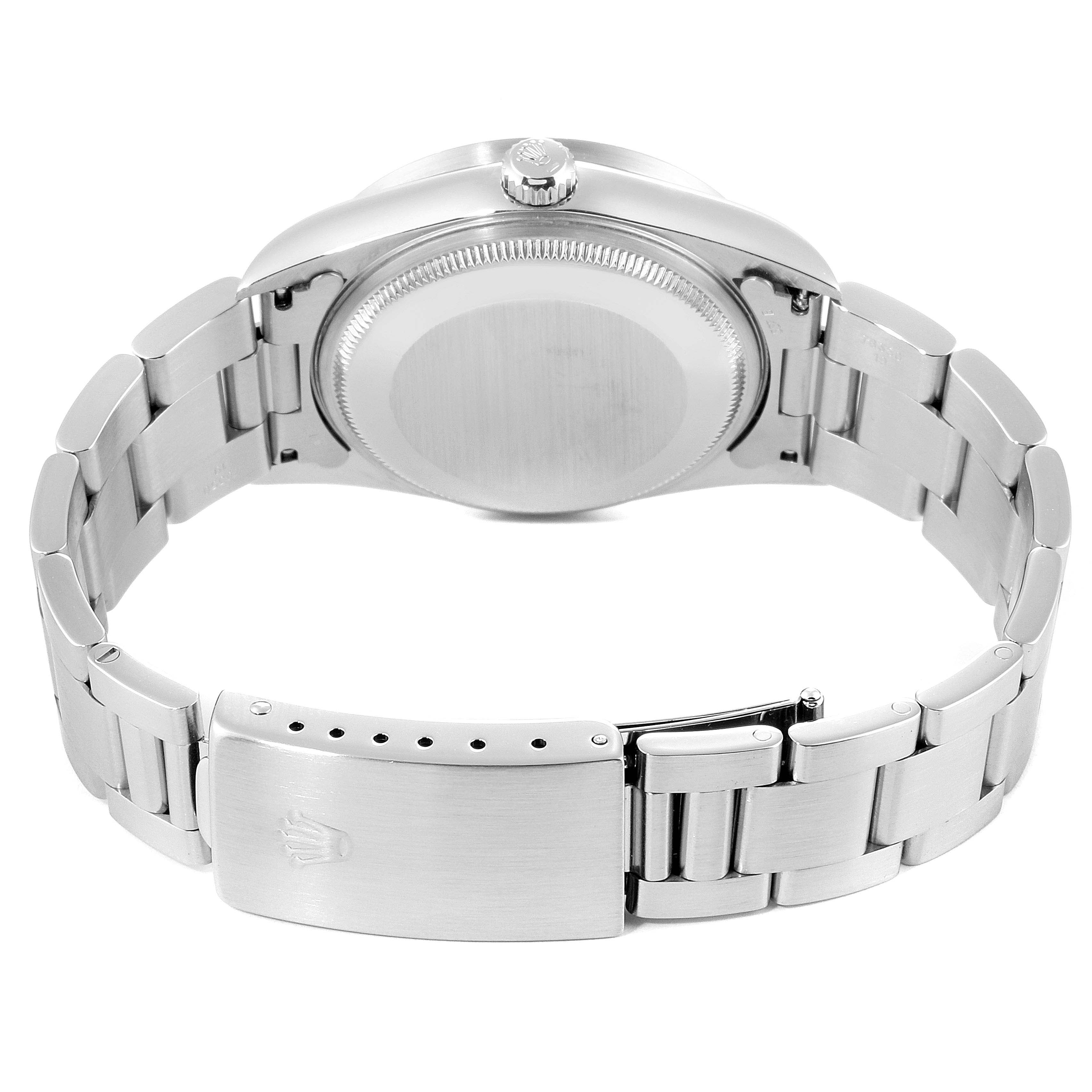 The image shows the back view of the Rolex Air-King 14010 Men's Stainless Steel Silver Dial 14010 Men's Stainless Steel Silver Dial watch, highlighting the clasp, bracelet, and case back.