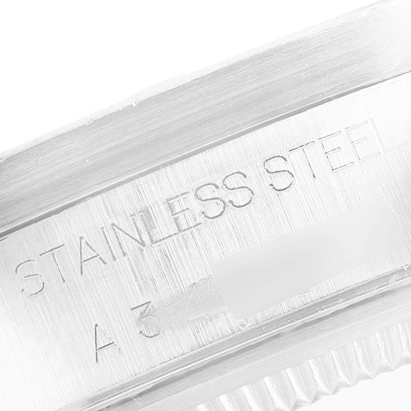 This image shows an up-close view of the stainless steel marking on the rim of the Rolex Air-King 14010 Men's Stainless Steel Silver Dial 14010 Men's Stainless Steel Silver Dial watch case.