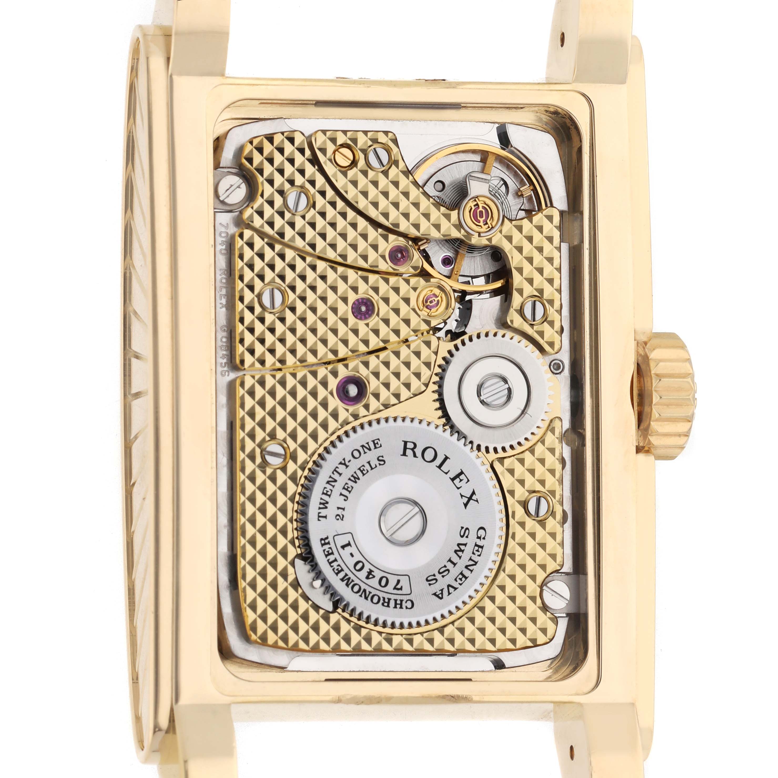 The image shows the back view of a Rolex Cellini 5440 Men's Yellow Gold Champagne Dial, displaying its ornate movement and internal components.