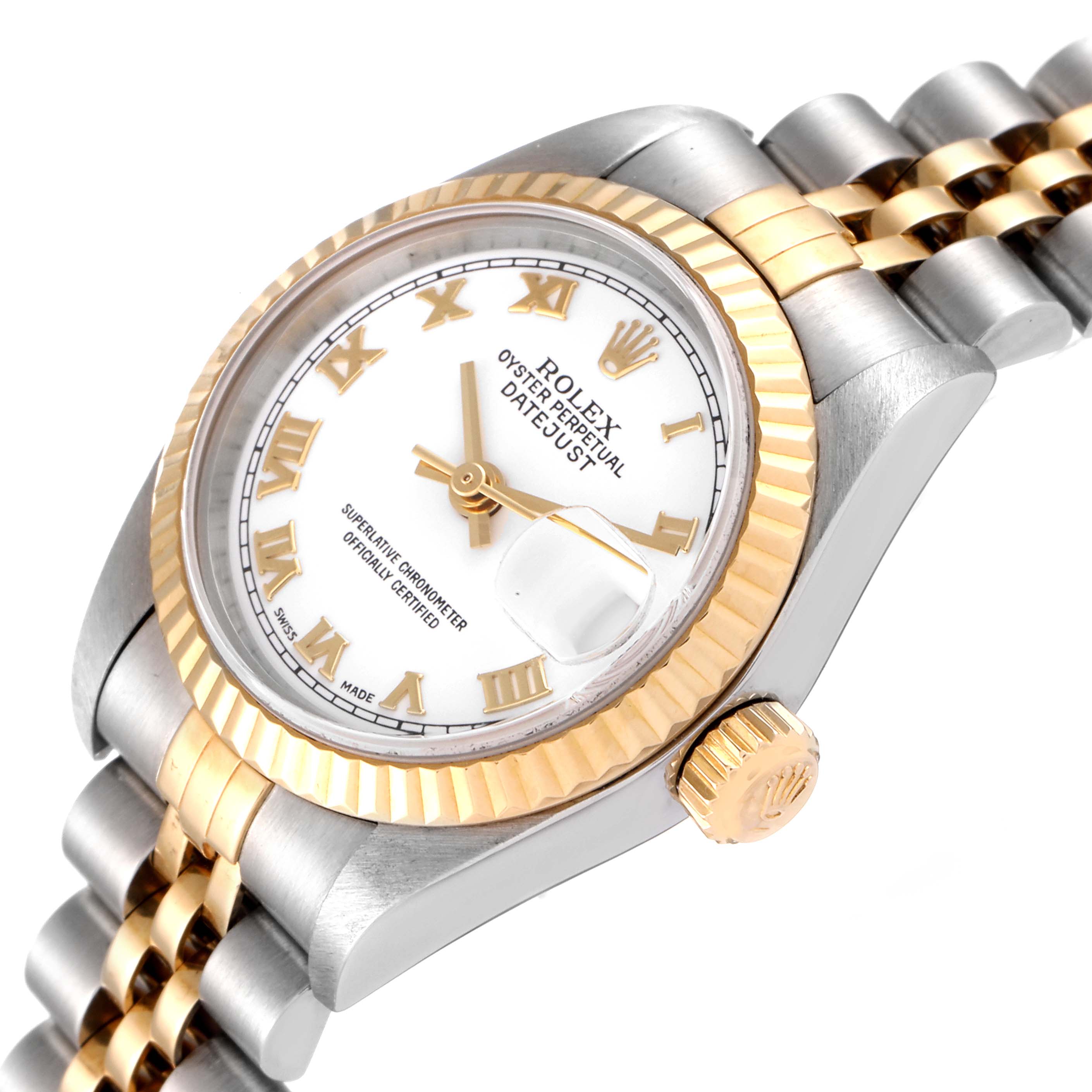 This image showcases a Rolex Datejust 79173 Women's Steel and Gold (two tone) White Dial 79173 Women's Steel and Gold (two tone) White Dial watch at an angled view, highlighting its face, bezel, crown, and bracelet.