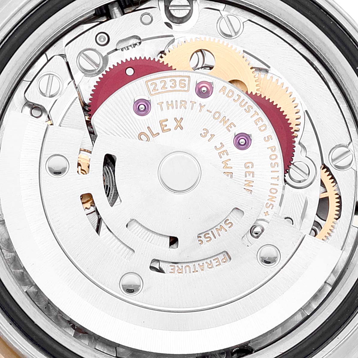 The image shows the internal mechanism of a Rolex Datejust 279173 Women's Steel and Gold (two tone) Champagne Dial 279173 Women's Steel and Gold (two tone) Champagne Dial watch, highlighting gears and inscriptions.