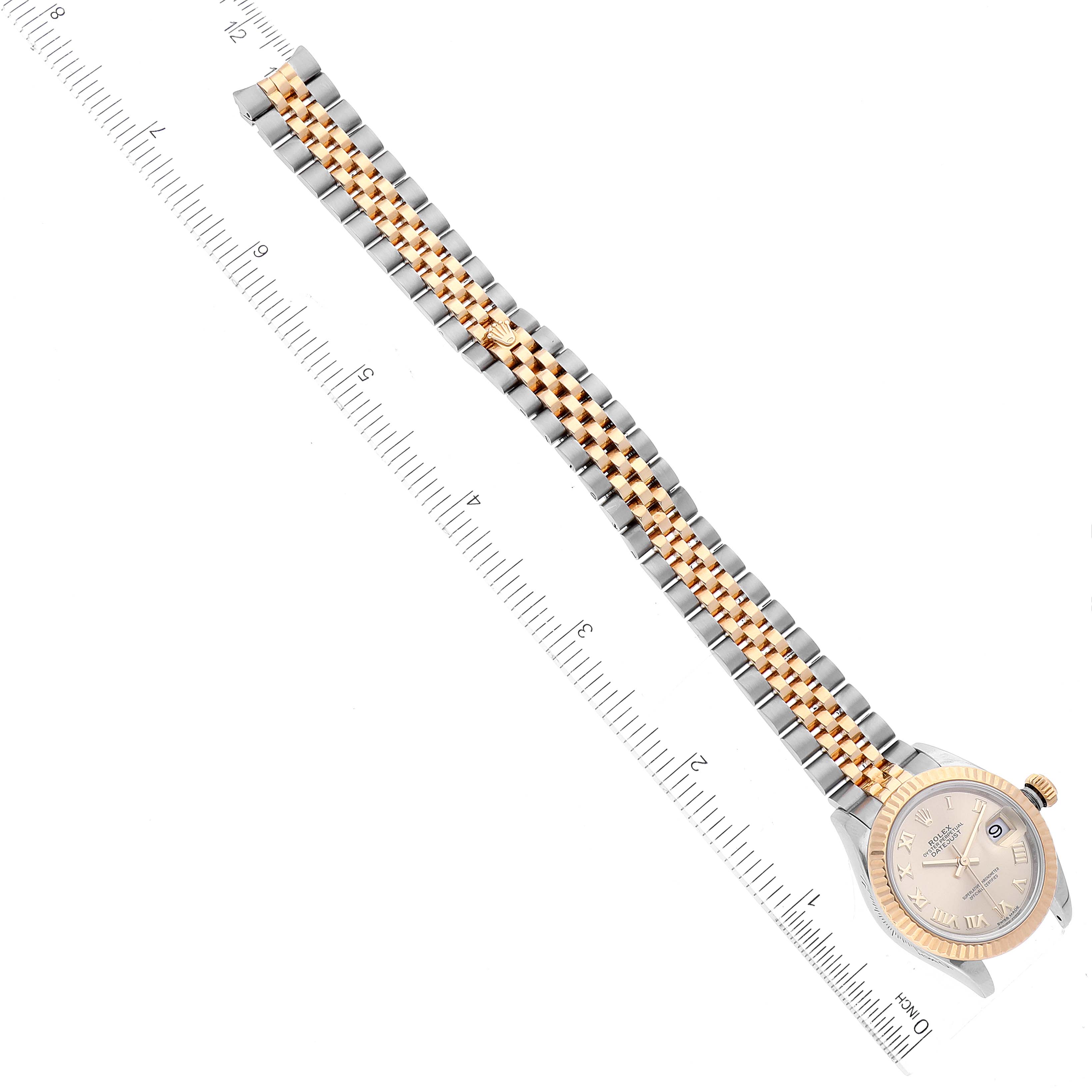 The image shows a Rolex Datejust 279173 Women's Steel and Gold (two tone) Champagne Dial 279173 Women's Steel and Gold (two tone) Champagne Dial watch laid flat next to a ruler, highlighting the entire bracelet and face.