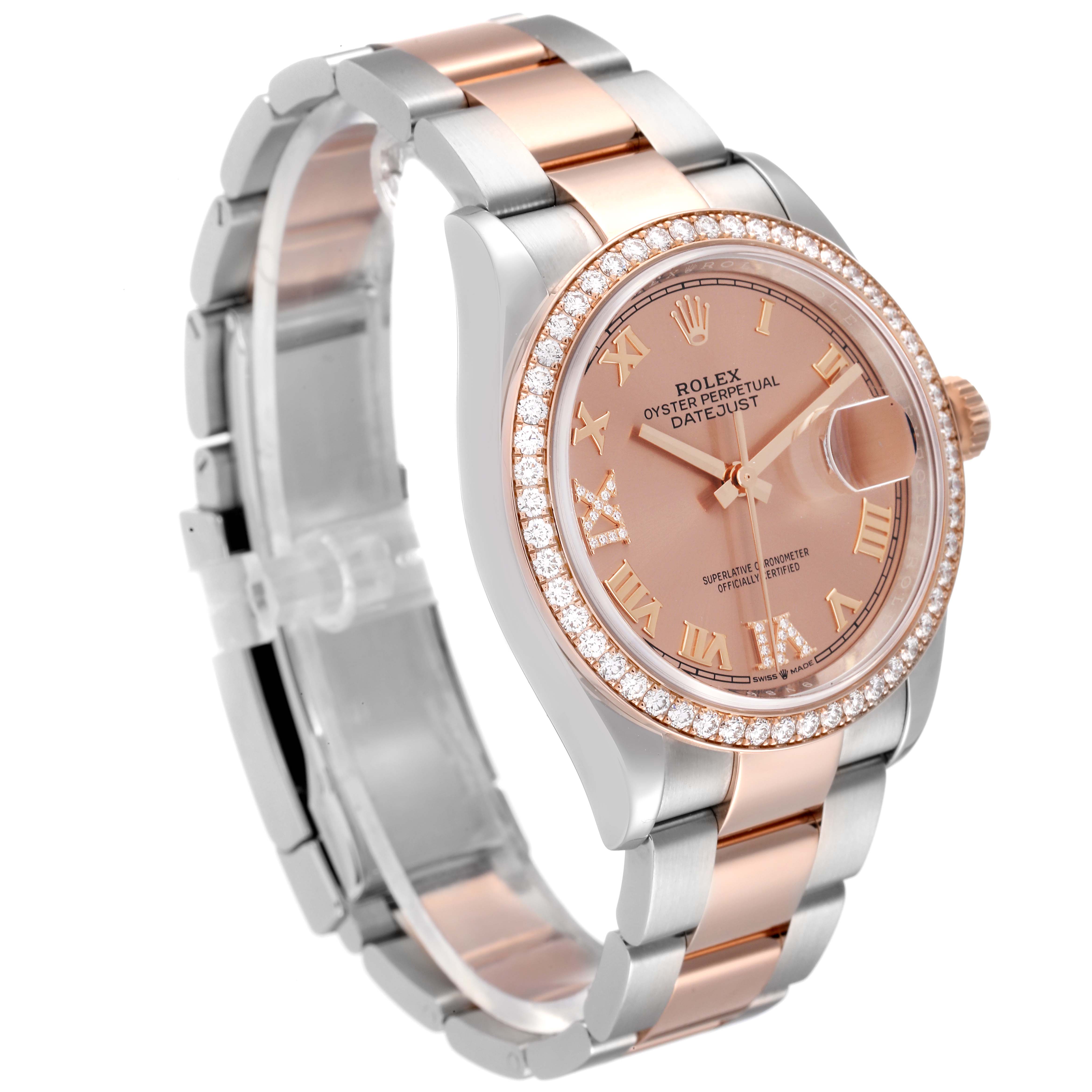 This Rolex Datejust 126281 Men's Steel and Gold (two tone) Pink Dial 126281 Men's Steel and Gold (two tone) Pink Dial watch is pictured at a slight angle, highlighting the rose gold face, bezel with diamonds, and two-tone bracelet.