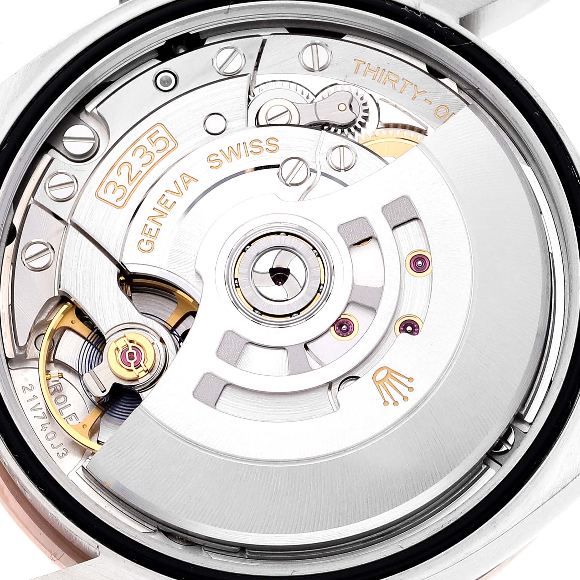This image shows the movement mechanism of the Rolex Datejust 126281 Men's Steel and Gold (two tone) Pink Dial 126281 Men's Steel and Gold (two tone) Pink Dial watch, highlighting parts like gears and the oscillating weight.