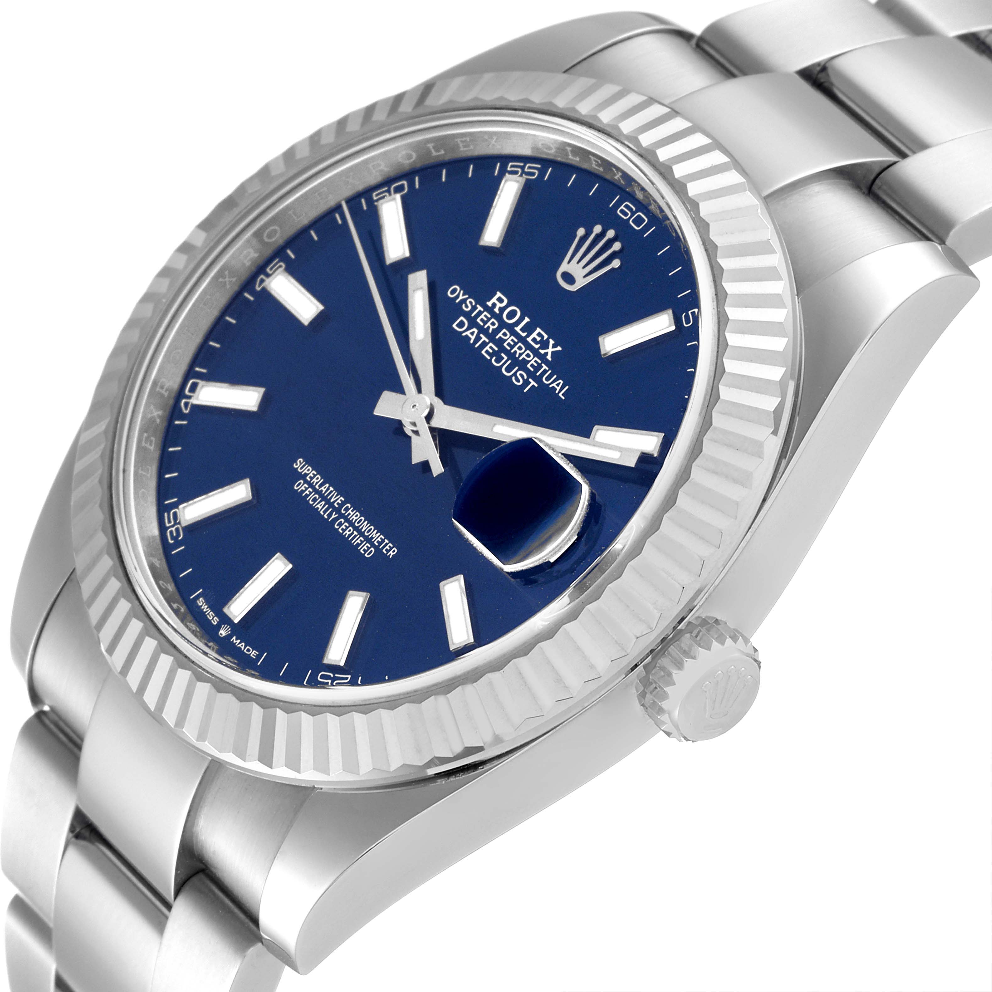 This image shows a close-up side angle of a Rolex Datejust 41 126334 Men's Stainless Steel Blue Dial 126334 Men's Stainless Steel Blue Dial watch, highlighting its blue dial, fluted bezel, and part of the bracelet.