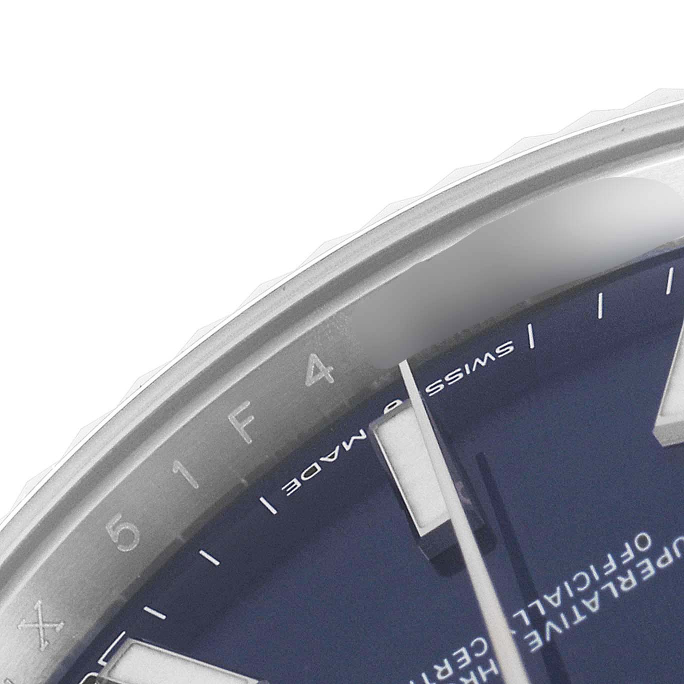 The image shows a close-up of the dial and part of the bezel of a Rolex Datejust 41 126334 Men
s Stainless Steel Blue Dial 126334 Men
s Stainless Steel Blue Dial watch from an angled top view.