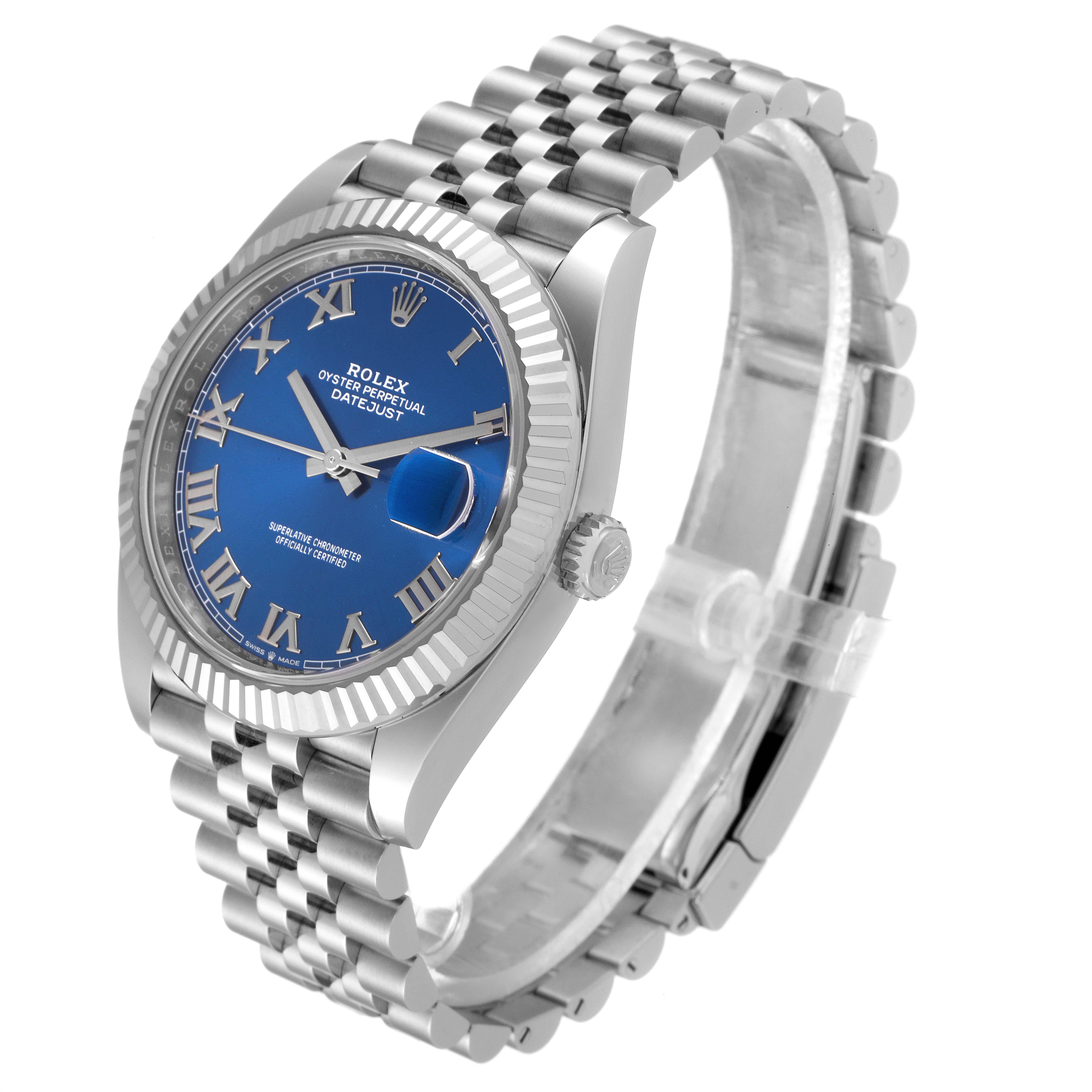 The Rolex Datejust 41 126334 Men
s Stainless Steel Blue Dial 126334 Men
s Stainless Steel Blue Dial watch is shown at an angle displaying the blue dial, fluted bezel, crown, and Jubilee bracelet.