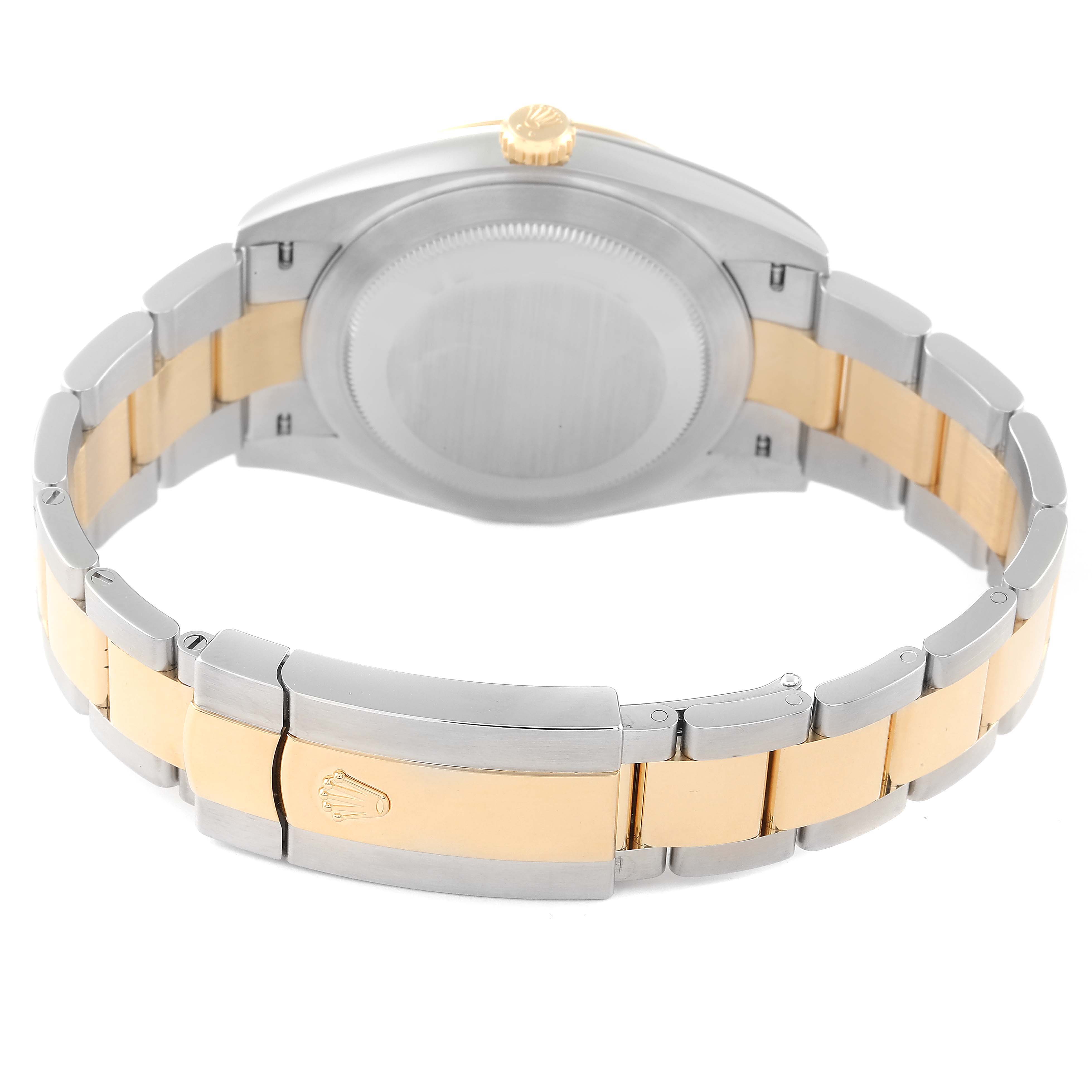 The image shows the back view of a Rolex Datejust 41 126333 Men's Steel and Gold (two tone) Grey Dial 126333 Men's Steel and Gold (two tone) Grey Dial watch, featuring its metal band and closed clasp.