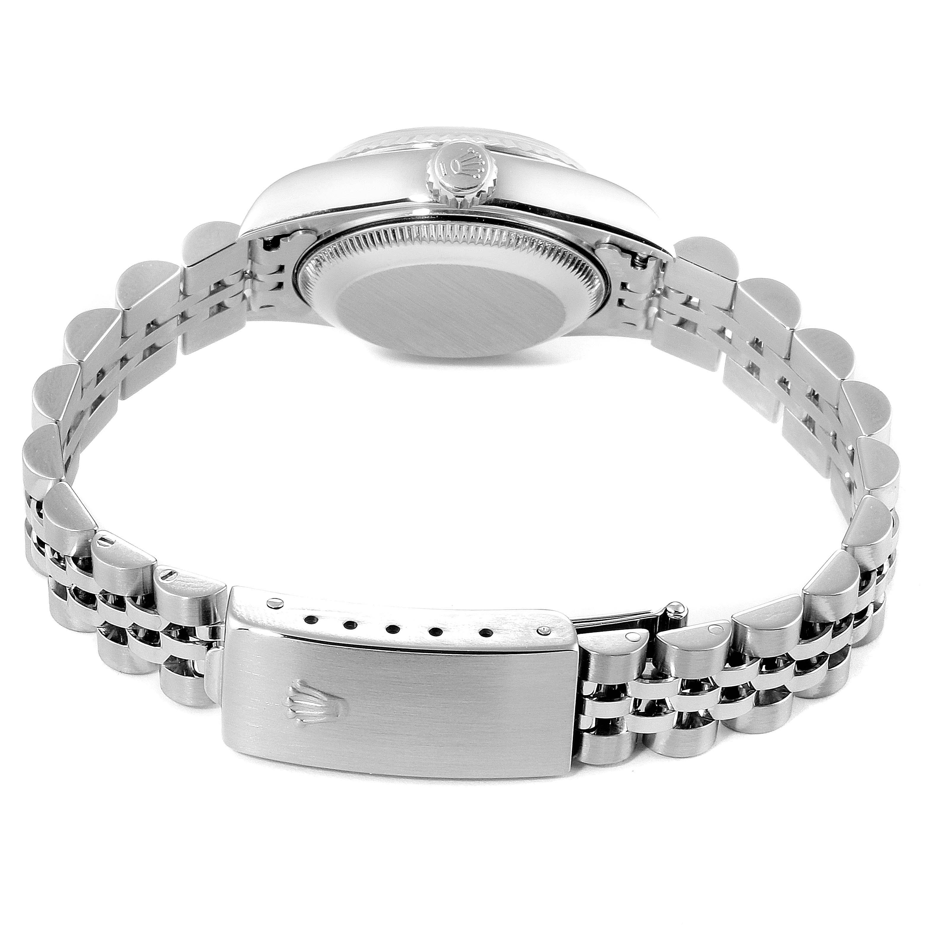 The image shows the back view of a Rolex Datejust 79174 Women's Stainless Steel White Dial 79174 Women's Stainless Steel White Dial watch focusing on the bracelet and clasp.