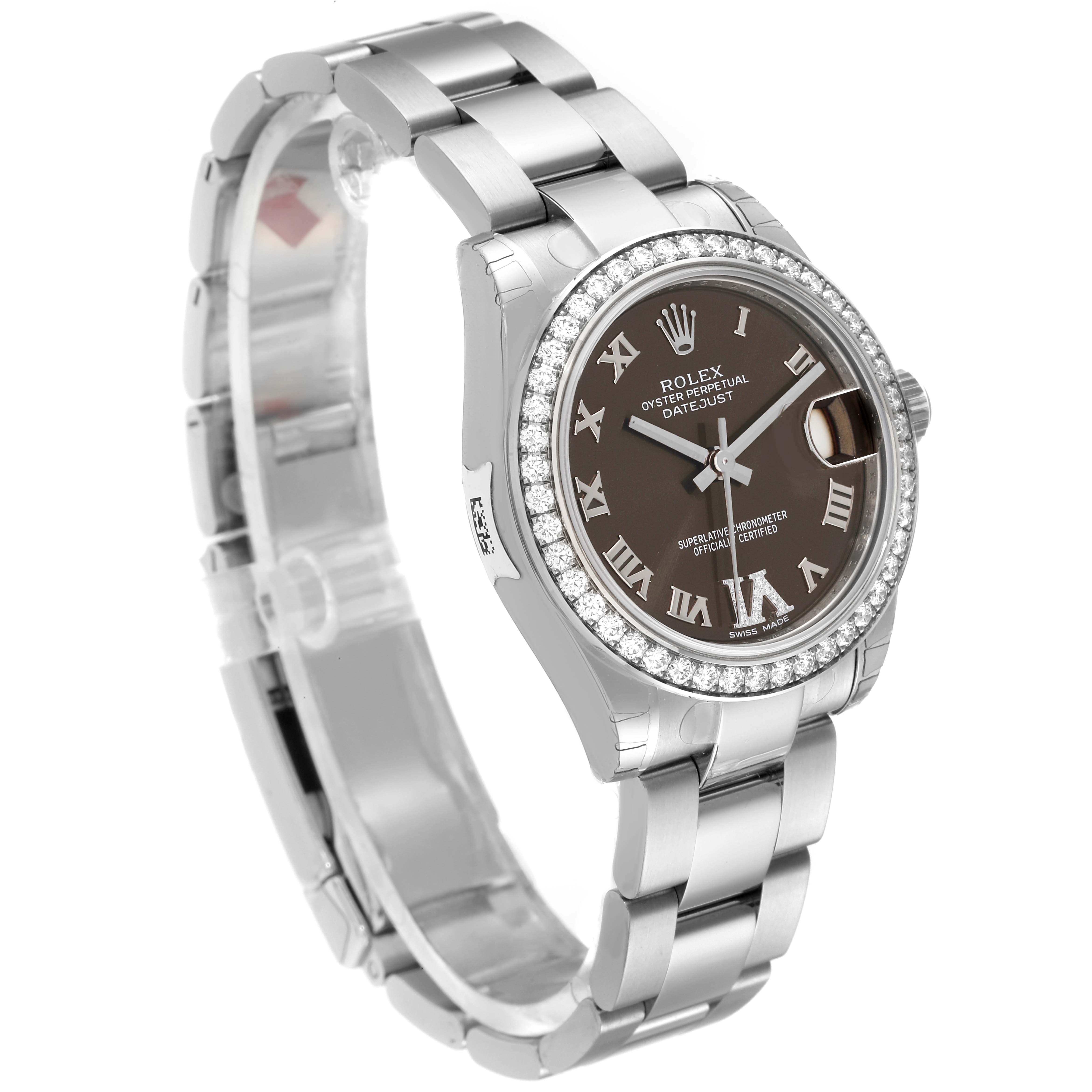 The Mid-Size Rolex watch is shown at a three-quarter angle, highlighting the bezel, face, and part of the bracelet.